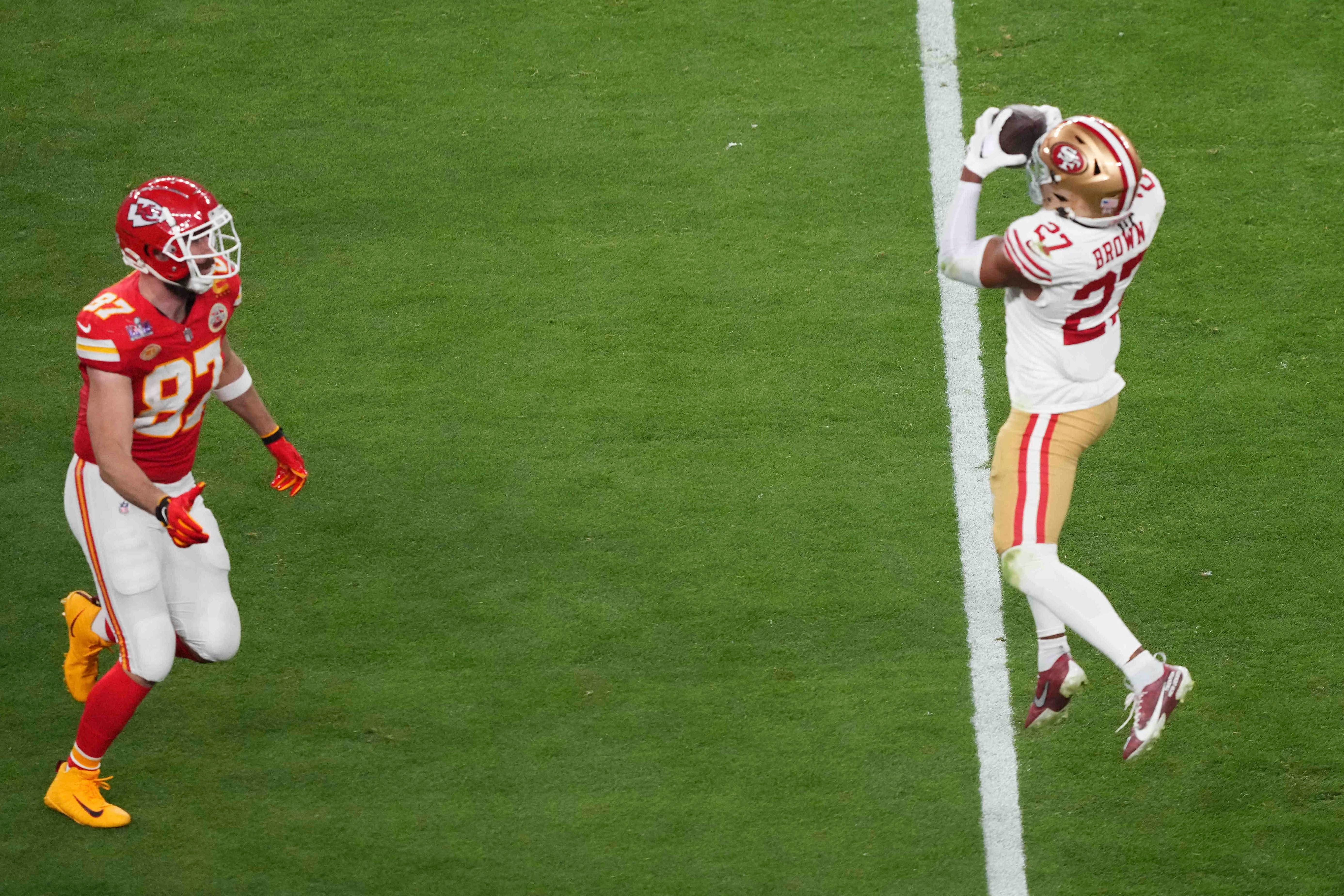 Feb 11, 2024; Paradise, Nevada, USA; San Francisco 49ers safety Ji'Ayir Brown (27) makes a catch against the Kansas City Chiefs during the third quarter of Super Bowl LVIII between Kansas City Chiefs and San Francisco 49ers at Allegiant Stadium.