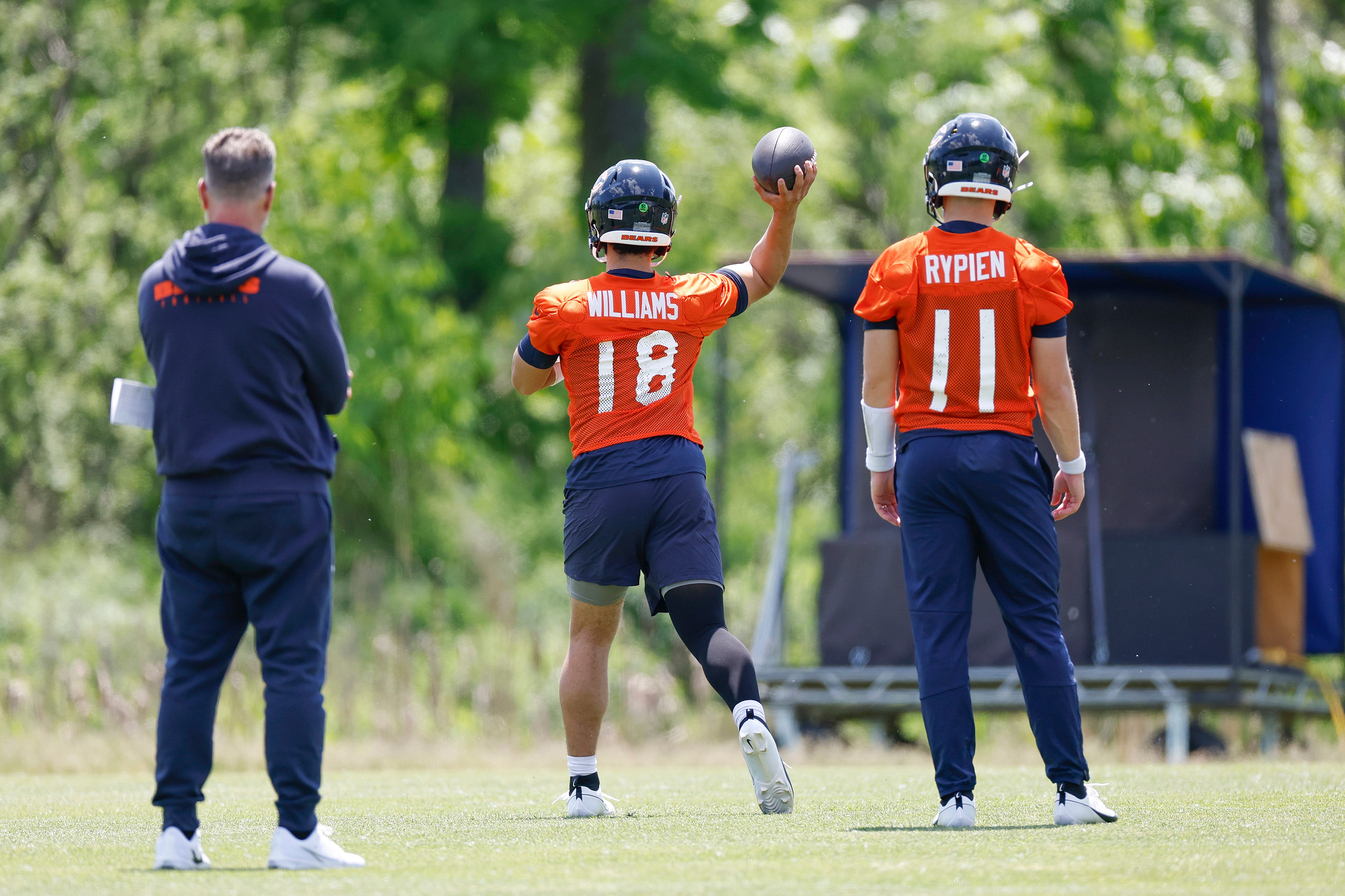 May 23, 2024; Lake Forest, IL, USA; Chicago Bears quarterback Caleb Williams (18) throws the ball during organized team activities at Halas Hall.
