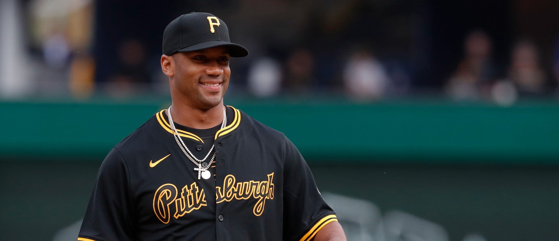 Apr 19, 2024; Pittsburgh, Pennsylvania, USA; Pittsburgh Steelers quarterback Russell Wilson (3) throws out a ceremonial first pitch before the Pittsburgh Pirates host the Boston Red Sox at PNC Park. Mandatory Credit: Charles LeClaire-USA TODAY Sports  