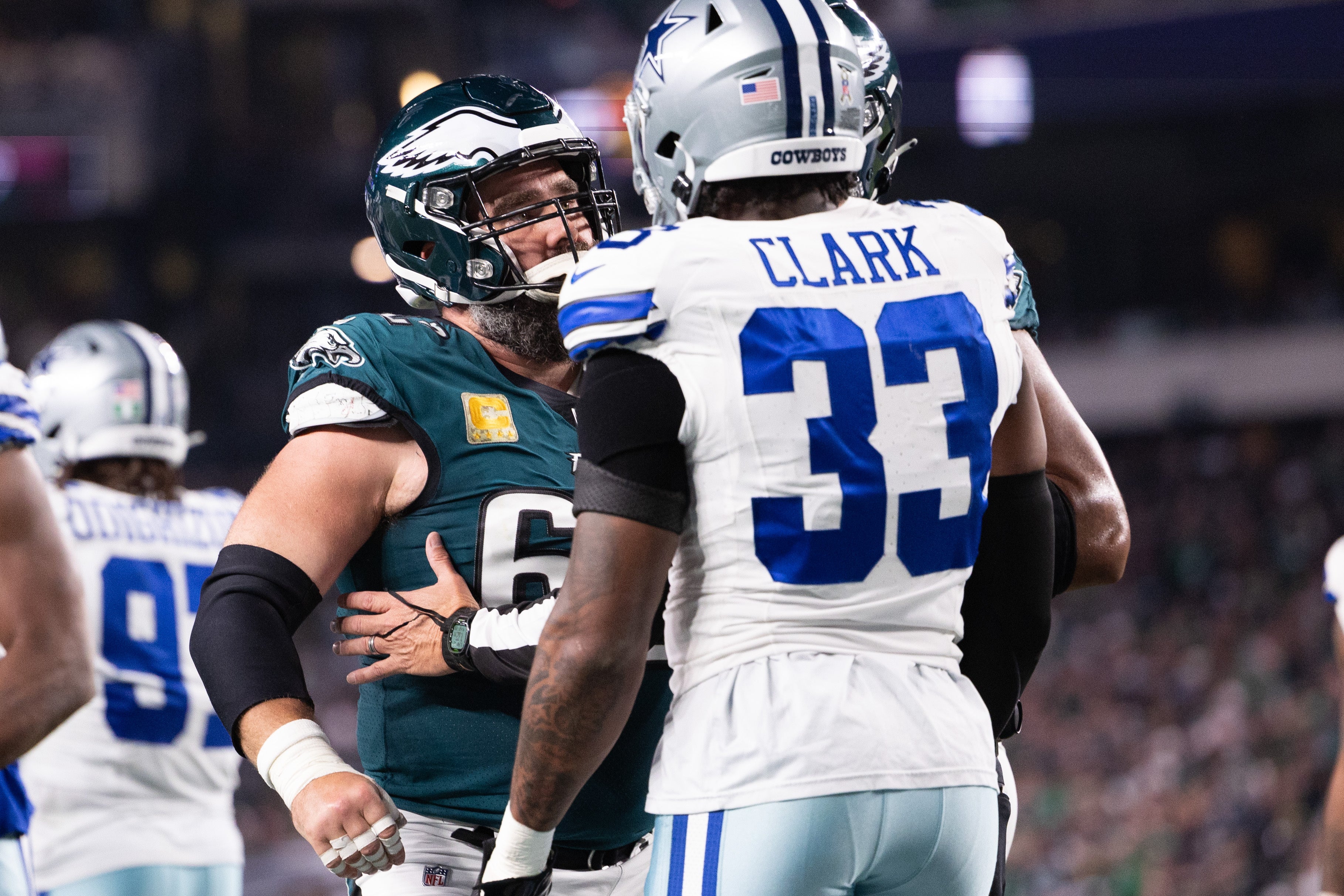 Philadelphia Eagles center Jason Kelce (62) has words with Dallas Cowboys linebacker Damone Clark (33) at Lincoln Financial Field.