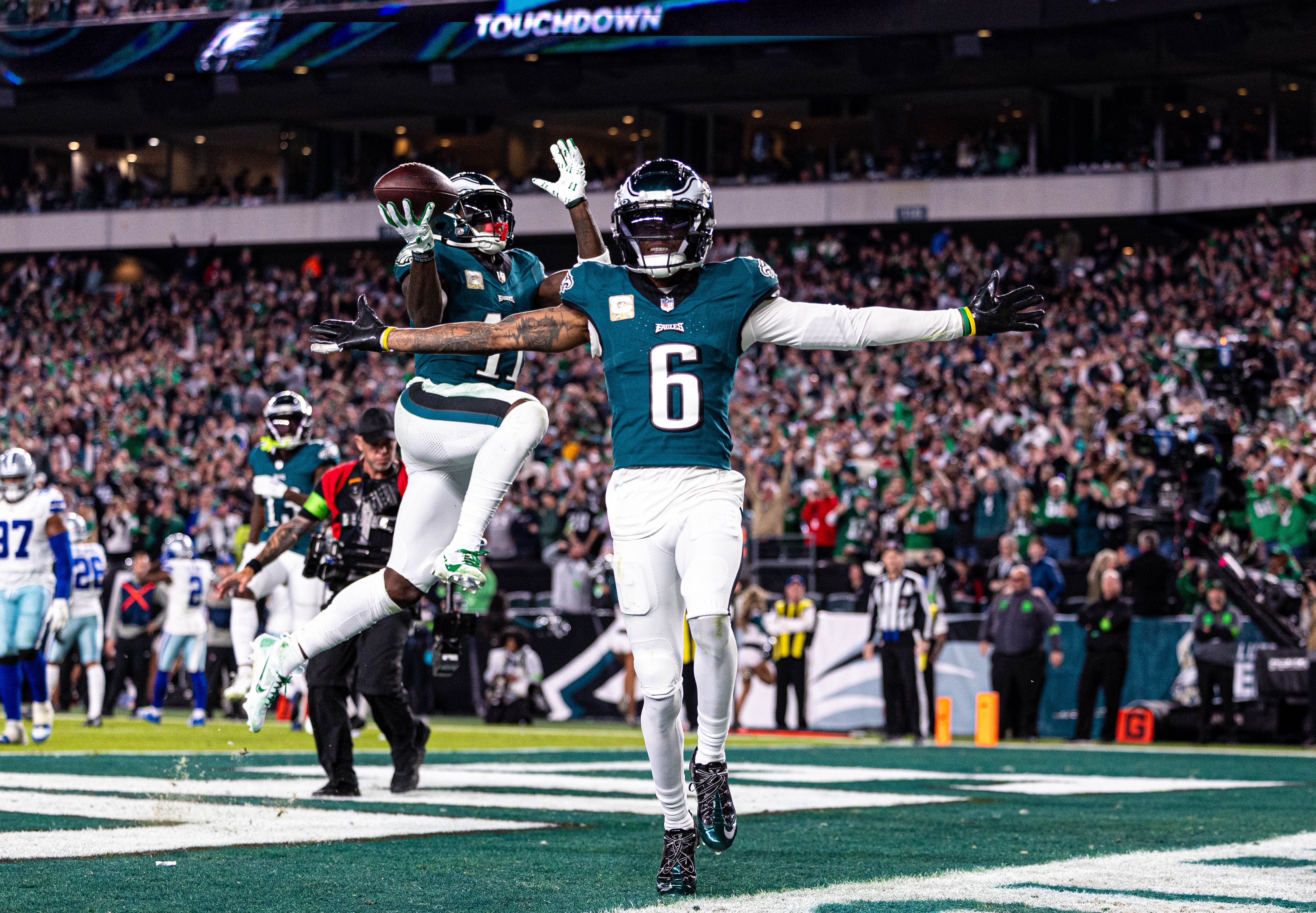 Philadelphia Eagles wide receiver DeVonta Smith (6) and wide receiver A.J. Brown (11) celebrate a touchdown against the Dallas Cowboys during the third quarter at Lincoln Financial Field.