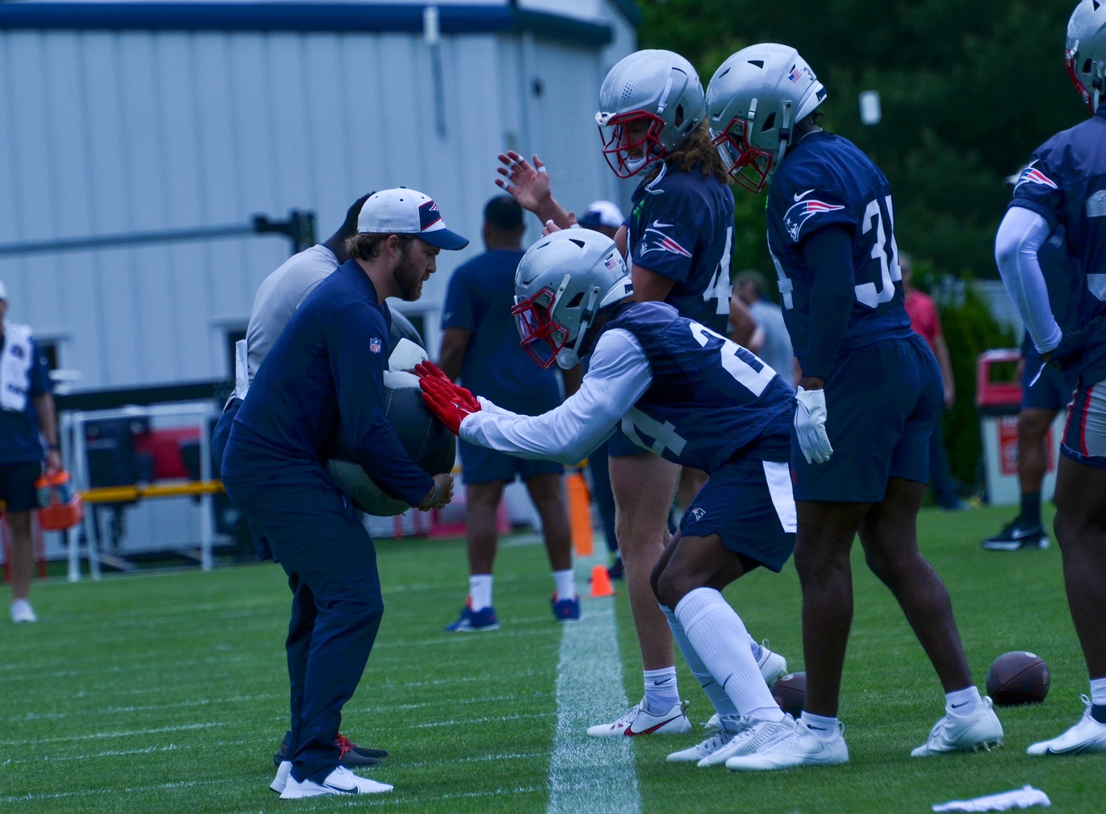 Safeties coach Brian Belichick works with the players at Wednesday's OTAs - May 29, 2024
