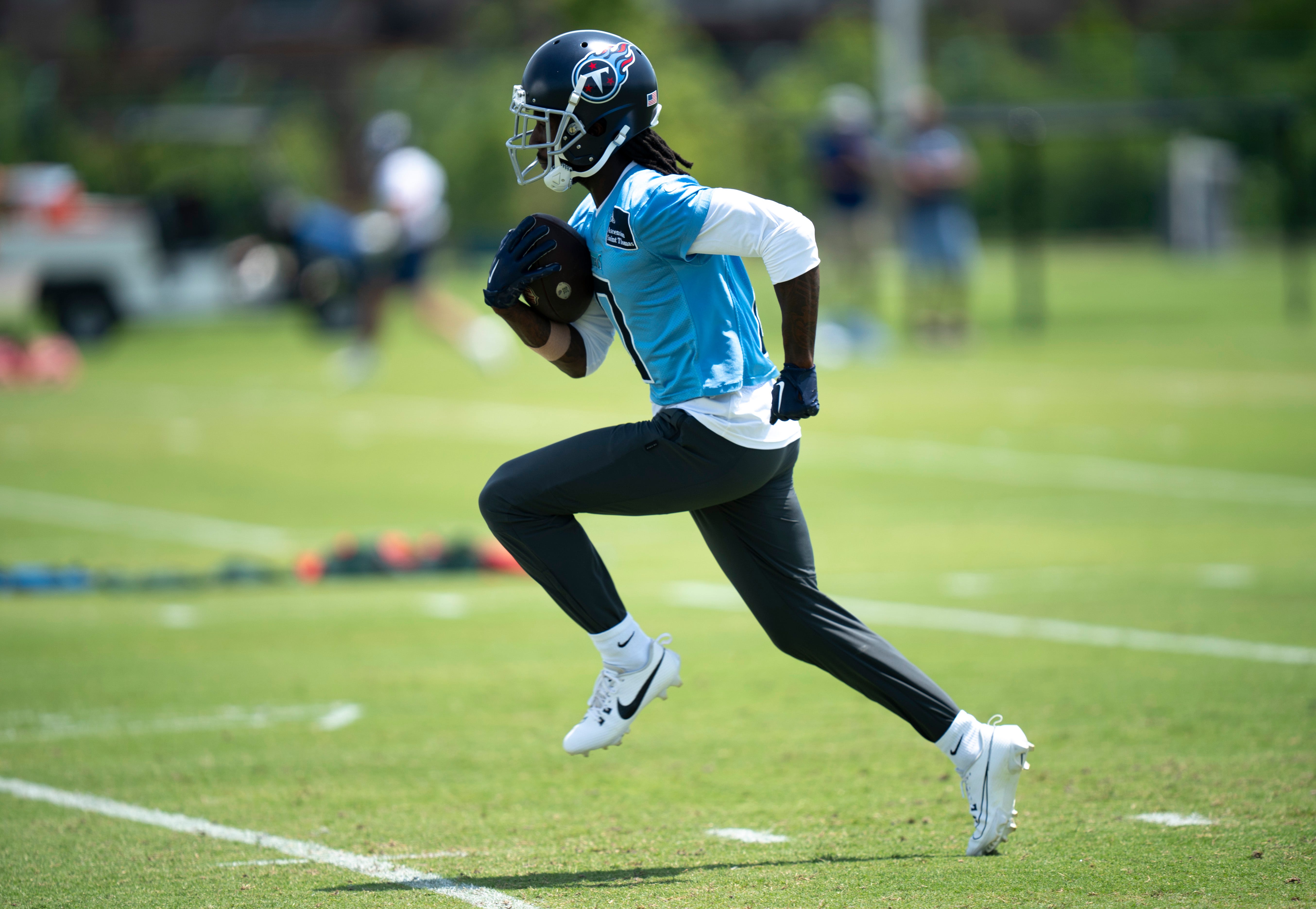 Wide receiver Calvin Ridley (0) runs after a catch during Tennessee Titans practice at Ascension Saint Thomas Sports Park in Nashville, Tenn., Wednesday, May 29, 2024.