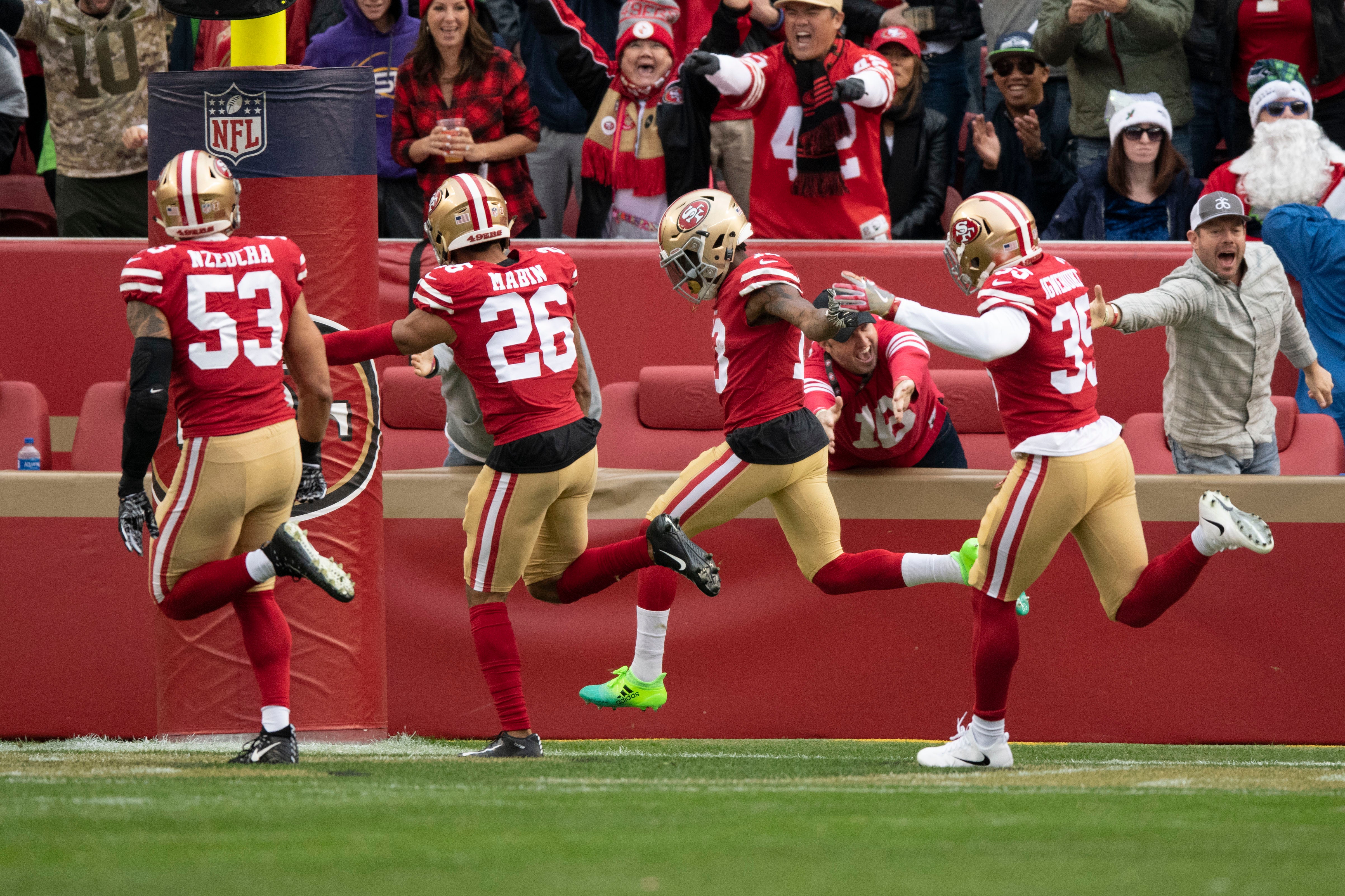 December 16, 2018; Santa Clara, CA, USA; San Francisco 49ers wide receiver Richie James (13) celebrates after scoring a touchdown on a kick return during the first quarter against the Seattle Seahawks at Levi's Stadium.
