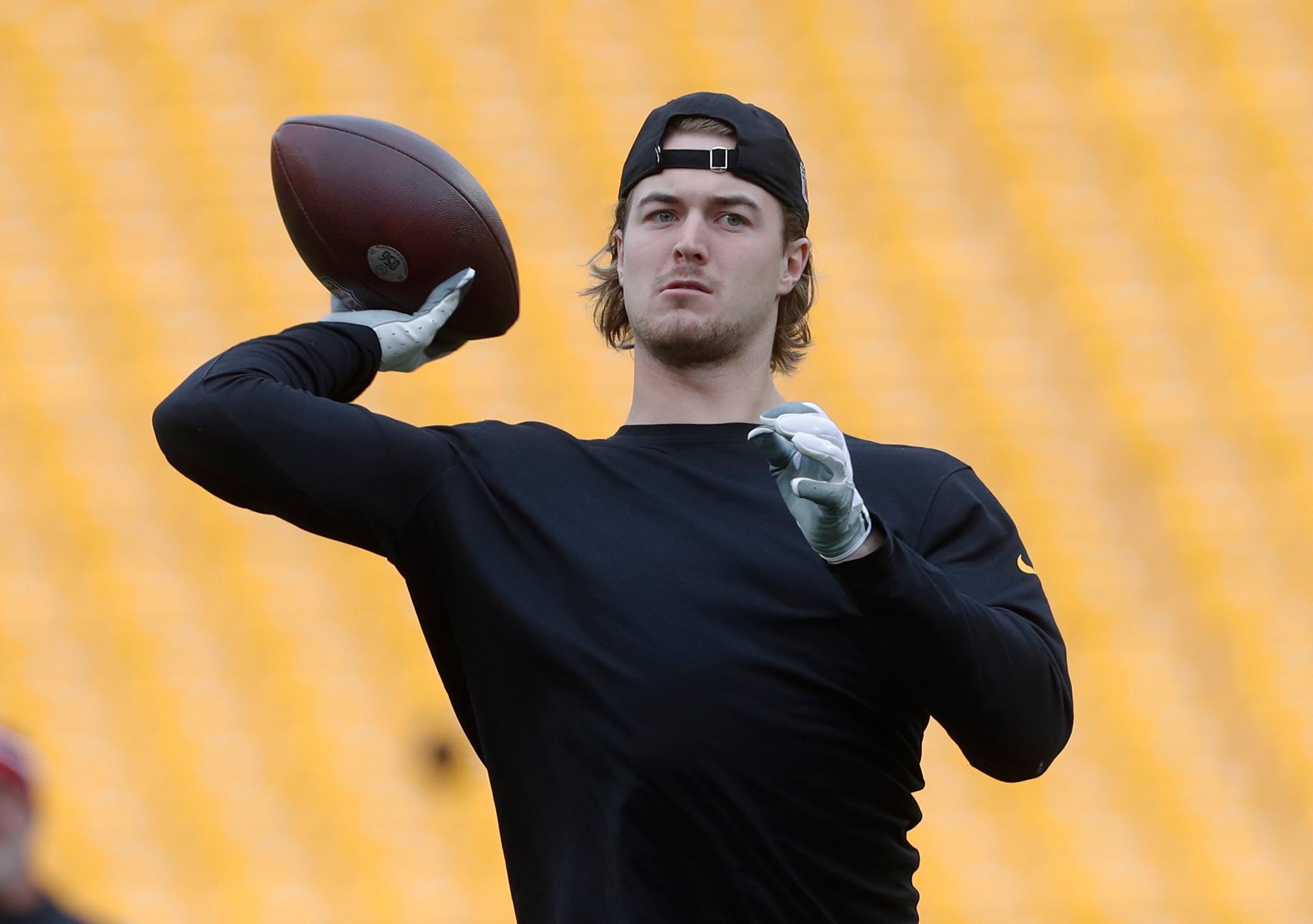 Pittsburgh Steelers quarterback Kenny Pickett (8) warms up before the game against the Arizona Cardinals at Acrisure Stadium.