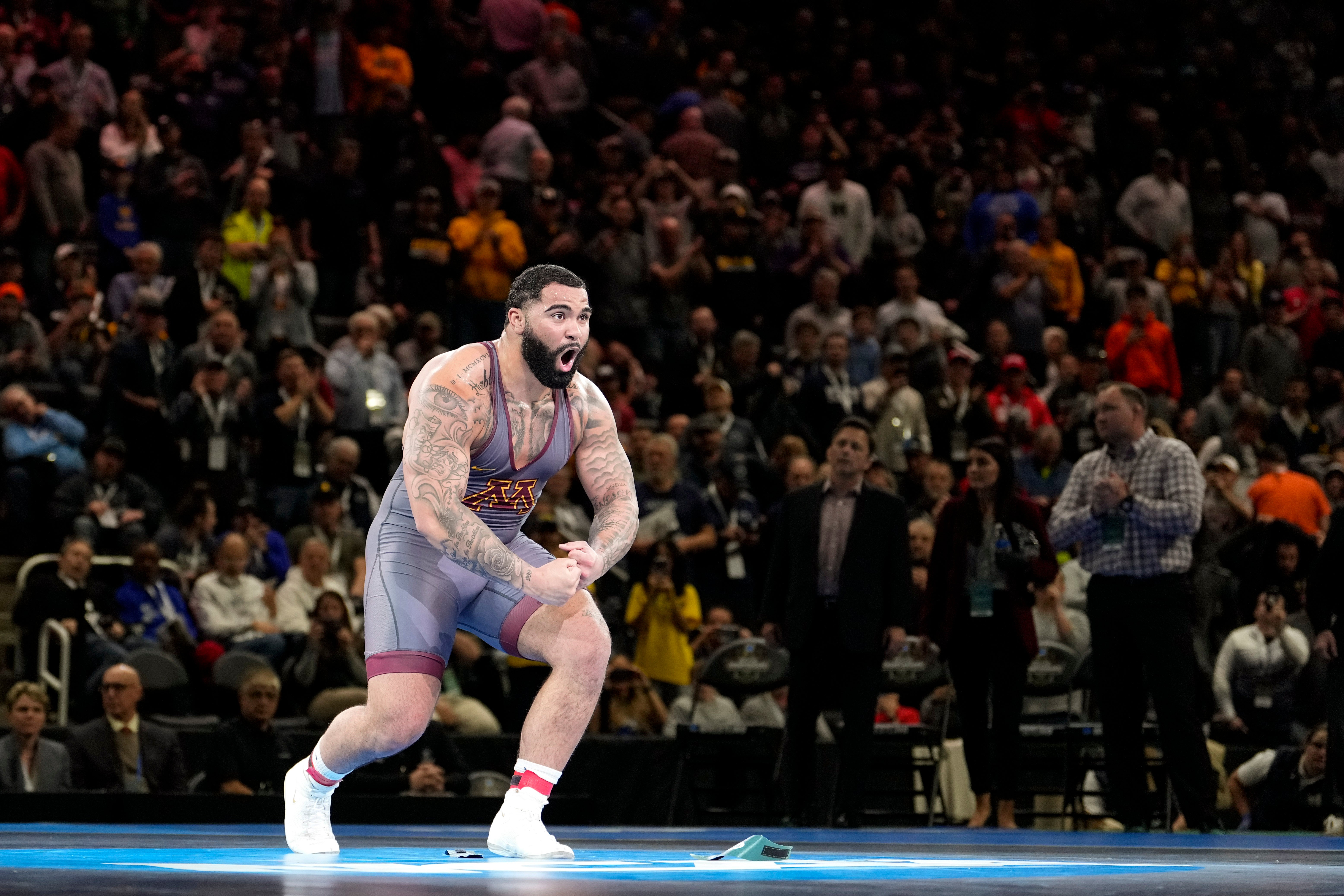 Mar 19, 2022; Detroit, MI, USA; Minnesota wrestler Gable Steveson celebrates after defeating Arizona State wrestler Cohlton Schultz (not pictured) in the 285 pound weight class final match during the NCAA Wrestling Championships at Little Cesars Arena.