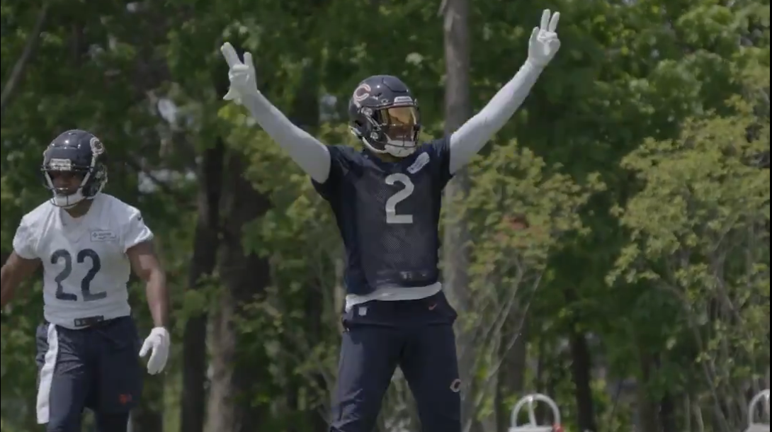 DJ Moore celebrates following a play during OTAs at Halas Hall.