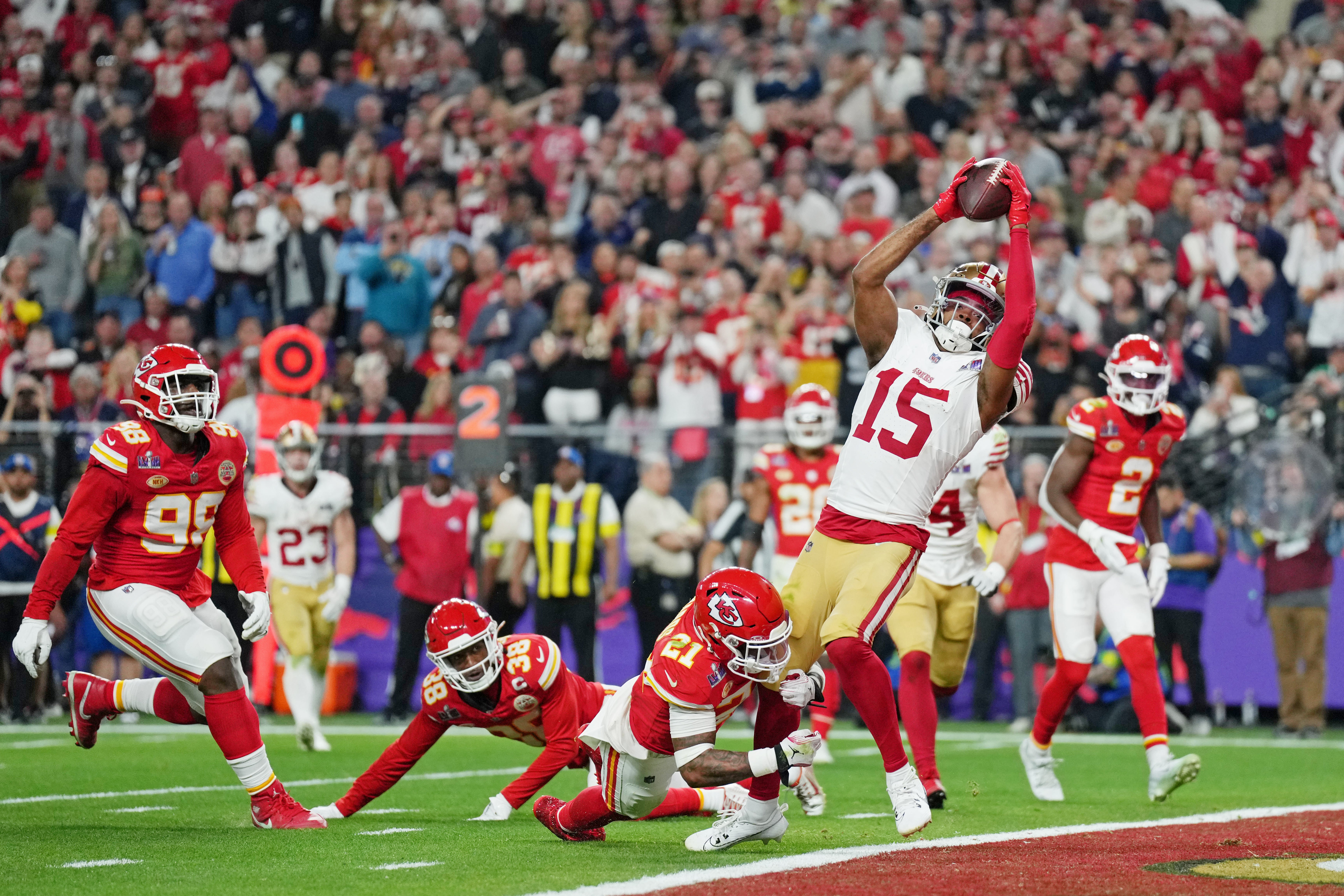 Feb 11, 2024; Paradise, Nevada, USA; San Francisco 49ers wide receiver Jauan Jennings (15) makes a catch for a touchdown against the Kansas City Chiefs during the fourth quarter of Super Bowl LVIII at Allegiant Stadium.