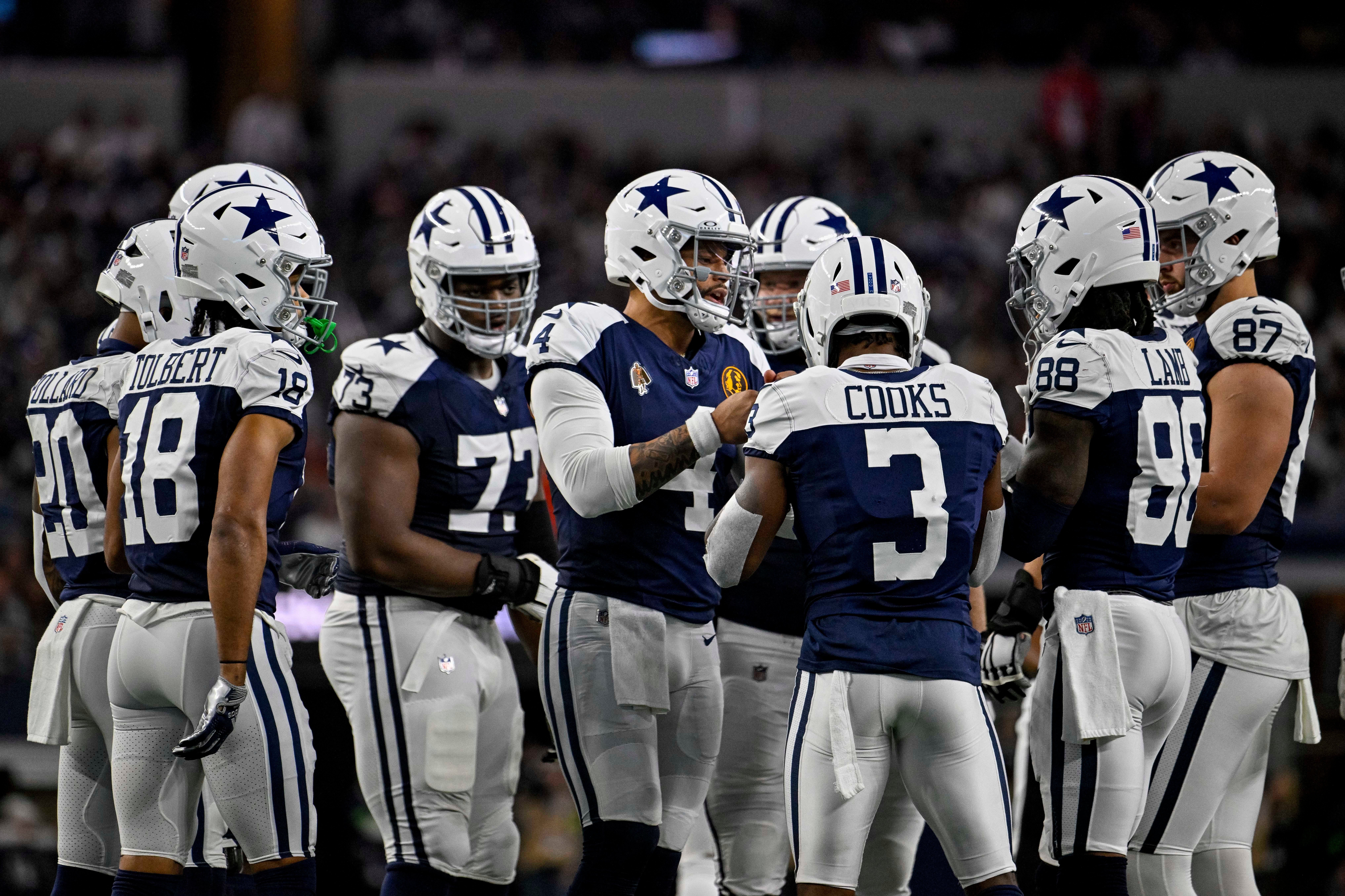 Dallas Cowboys running back Tony Pollard (20) and wide receiver Jalen Tolbert (18) and quarterback Dak Prescott (4) and wide receiver Brandin Cooks (3) and wide receiver CeeDee Lamb (88) and tight end Jake Ferguson (87) during the game between the Dallas Cowboys and the Washington Commanders at AT&T Stadium.