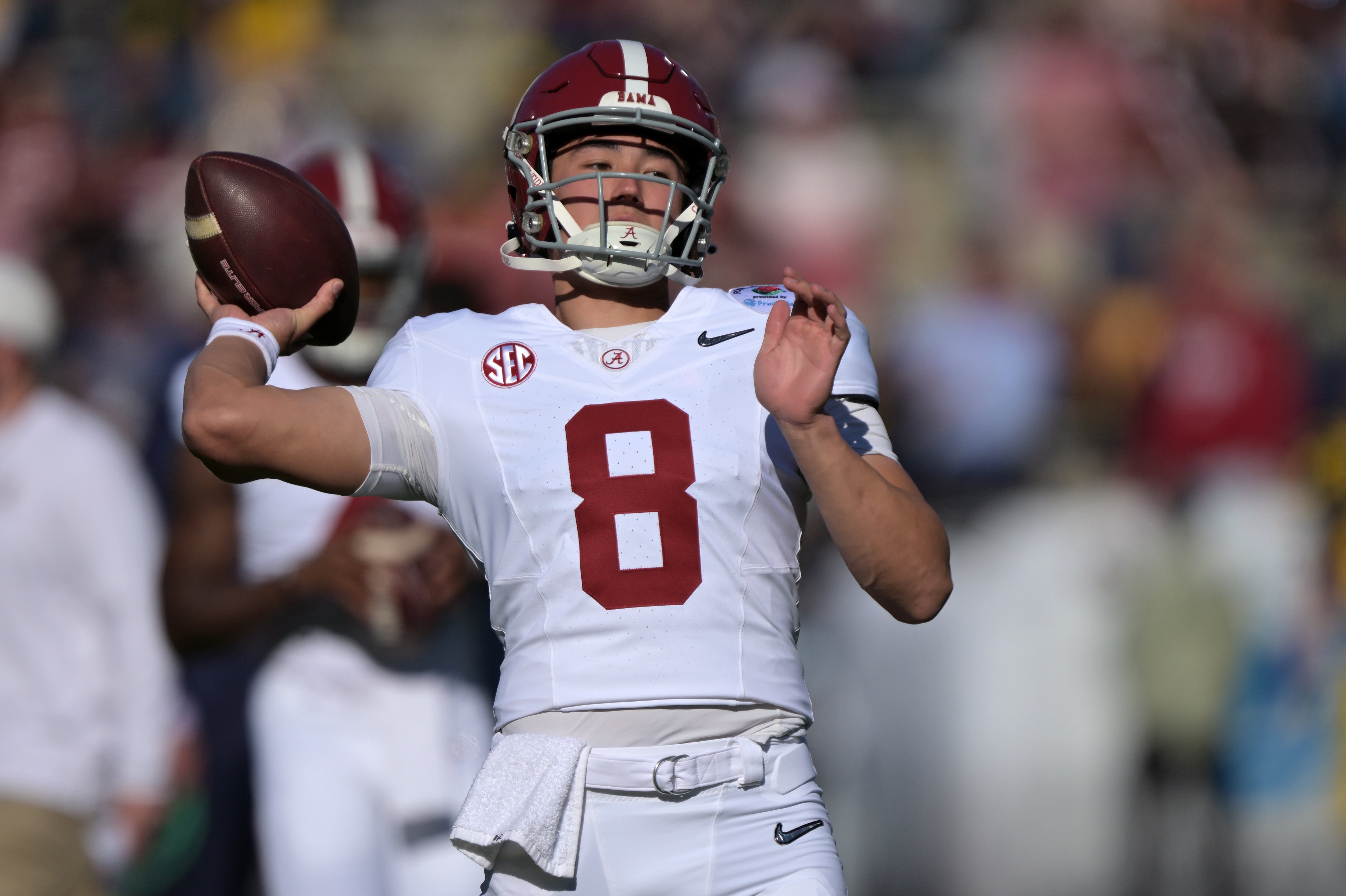Jan 1, 2024; Pasadena, CA, USA; Alabama Crimson Tide quarterback Tyler Buchner (8) warms up before the game against the Michigan Wolverines in the 2024 Rose Bowl college football playoff semifinal game at Rose Bowl. Mandatory Credit: Jayne Kamin-Oncea-USA TODAY Sports