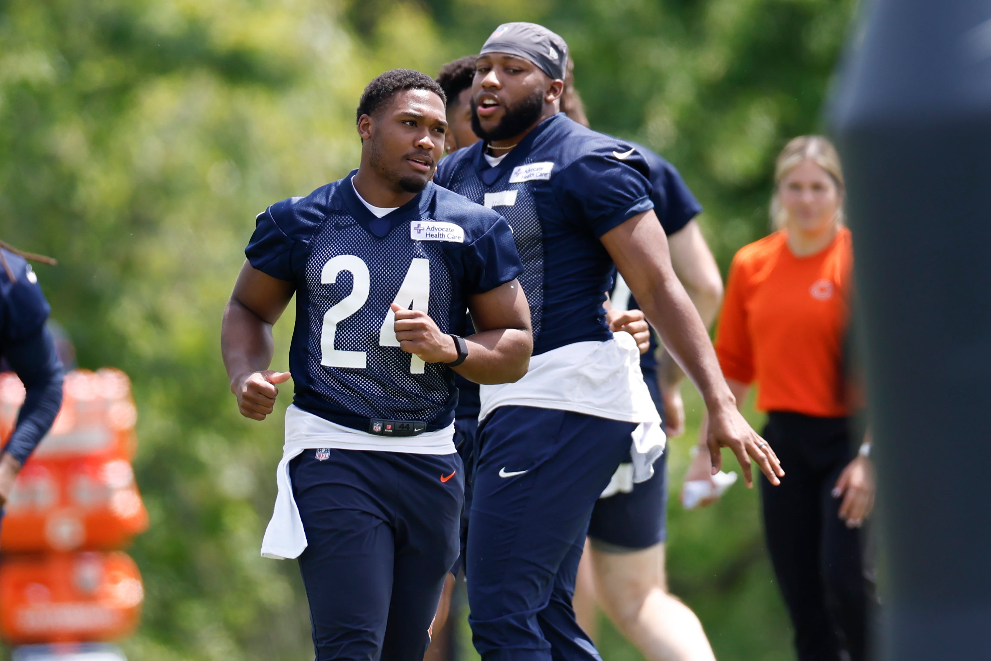May 31, 2024; Lake Forest, IL, USA; Chicago Bears running back Khalil Herbert (24) warms up during organized team activities at Halas Hall.