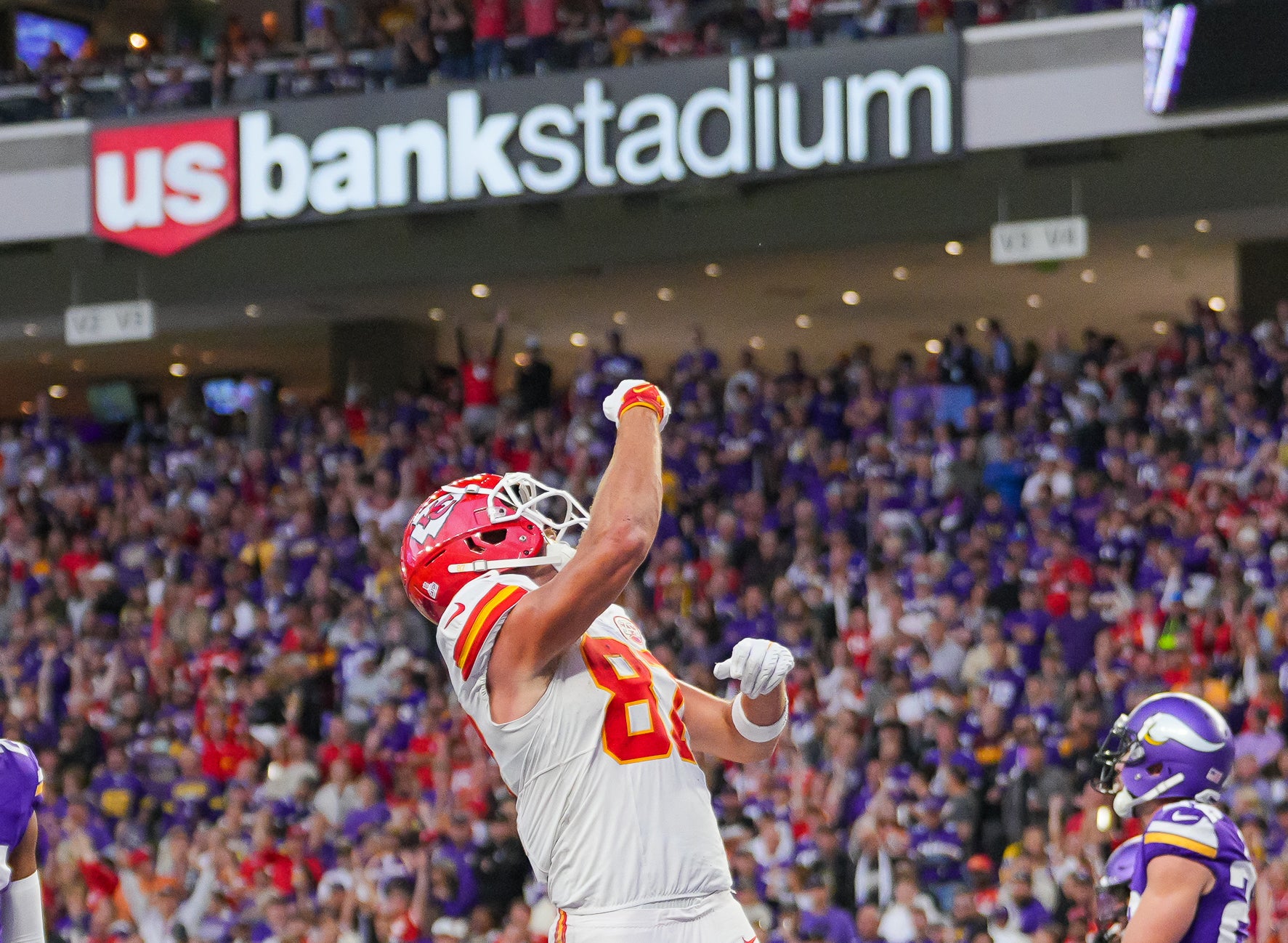 Oct 8, 2023; Minneapolis, Minnesota, USA; Kansas City Chiefs tight end Travis Kelce (87) celebrates his touchdown against the Minnesota Vikings in the third quarter at U.S. Bank Stadium.