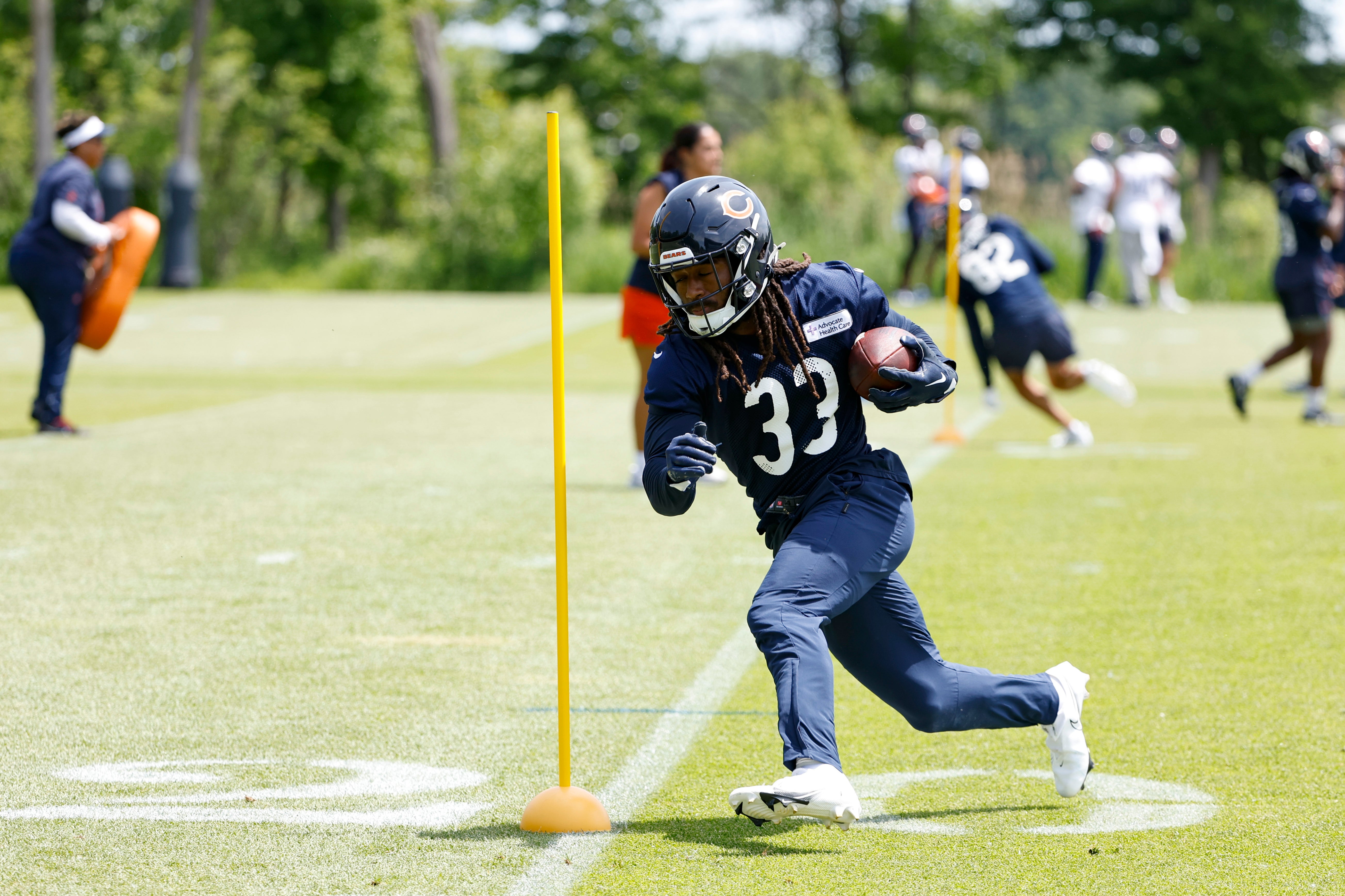 May 31, 2024; Lake Forest, IL, USA; Chicago Bears running back Ian Wheeler (33) runs during organized team activities at Halas Hall.
