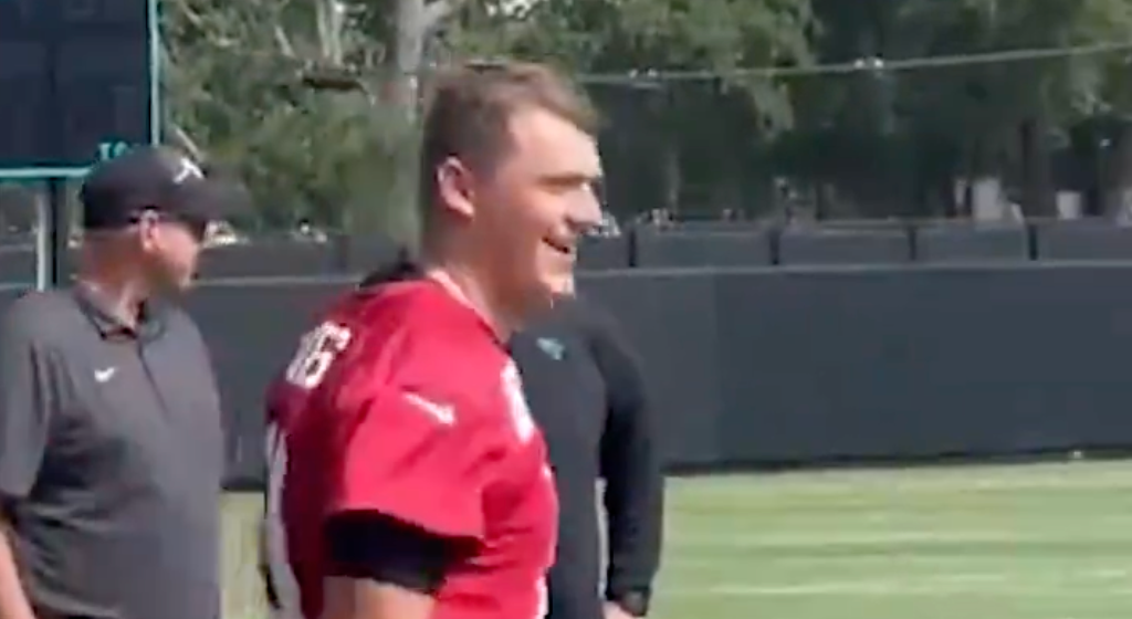 Mac Jones dances after finishing a drill during OTAs with the Jacksonville Jaguars