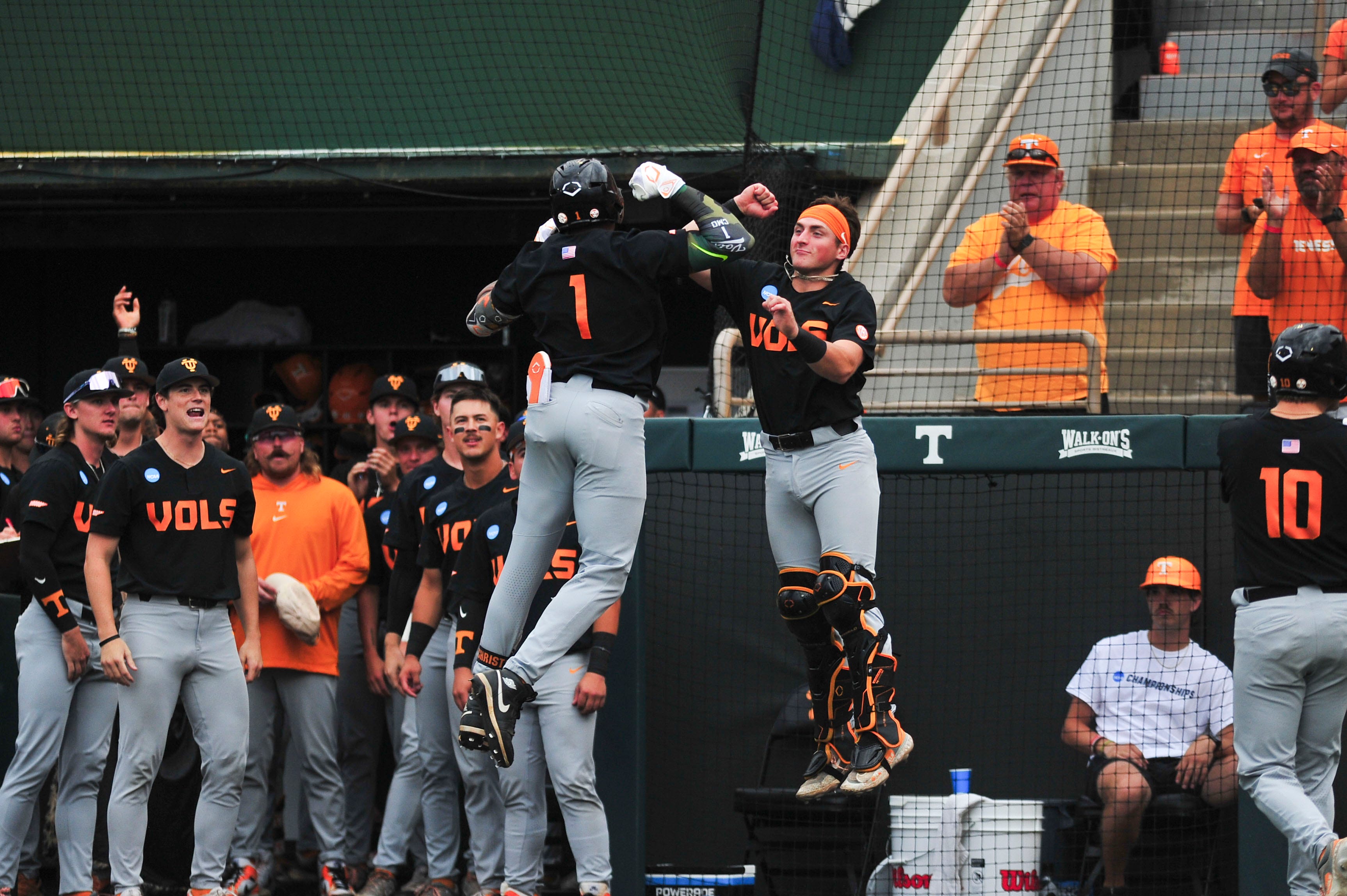Tennessee's Christian Moore (1) and Tennessee's Cannon Peebles (5) celebrate after Moore hits a home run during a NCAA Baseball Tournament Knoxville Regional game at Lindsey Nelson Stadium on Saturday, June 1, 2024 in Knoxville, Tenn.
