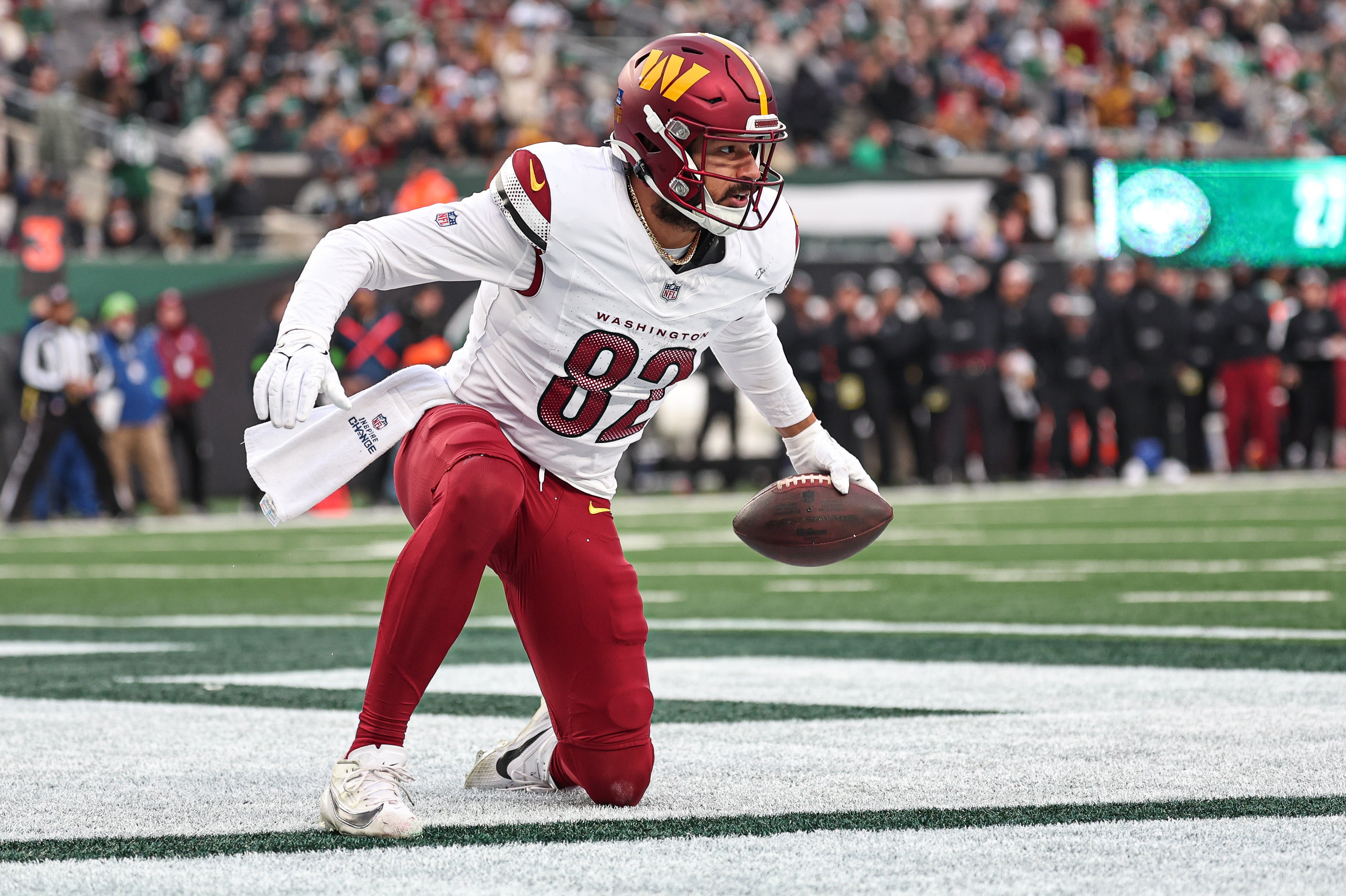Dec 24, 2023; East Rutherford, New Jersey, USA; Washington Commanders tight end Logan Thomas (82) reacts after a touchdown reception during the second half against the New York Jets at MetLife Stadium.