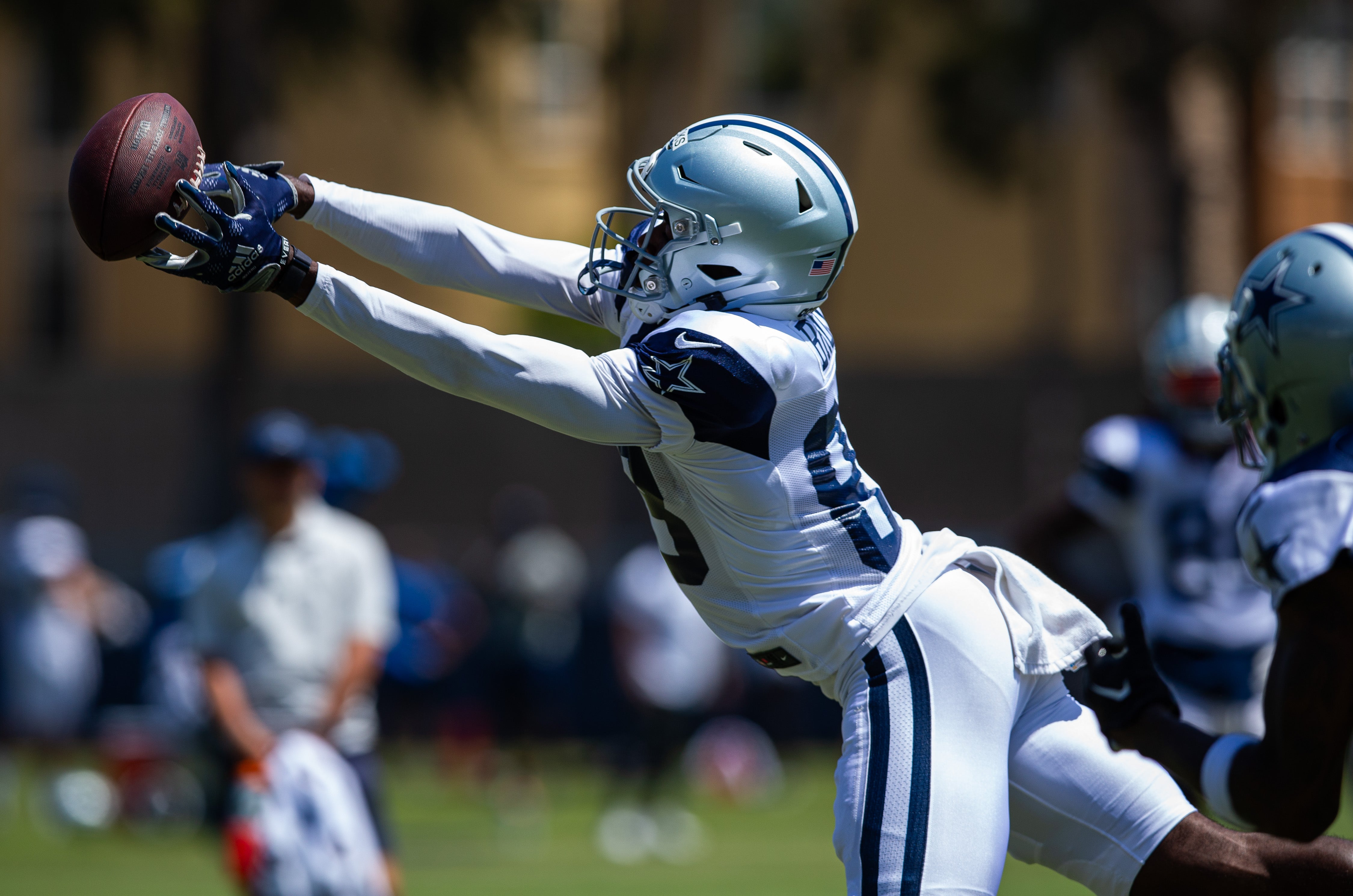 Dallas Cowboys wide receiver Jalen Brooks (83) reaches for the ball during training camp at Marriott Residence Inn-River Ridge playing fields.
