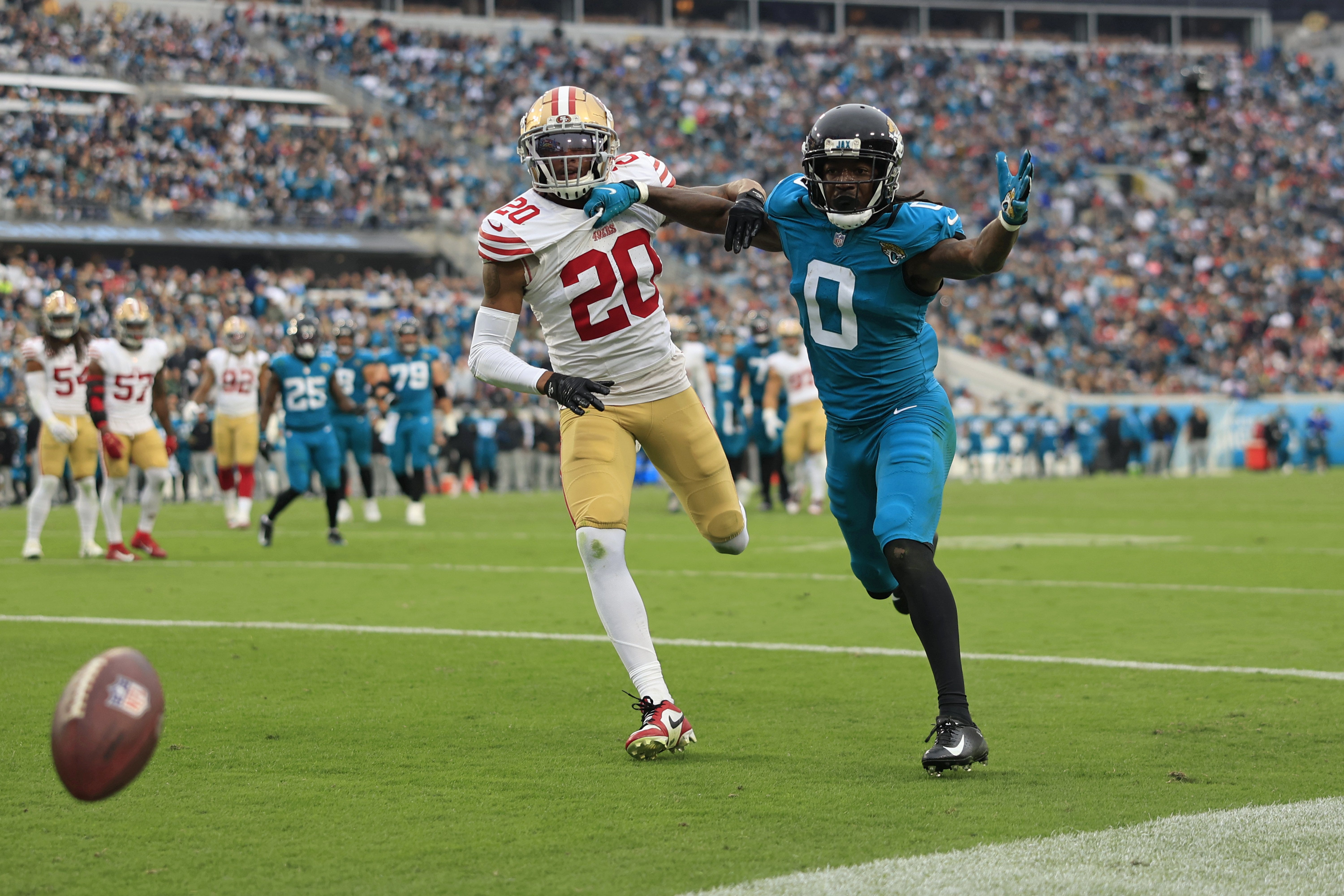 Jacksonville Jaguars wide receiver Calvin Ridley (0) can t haul in a reception as San Francisco 49ers cornerback Ambry Thomas (20) pressures during the third quarter of an NFL football game Sunday, Nov. 12, 2023 at EverBank Stadium in Jacksonville, Fla. The San Francisco 49ers defeated the Jacksonville Jaguars 34-3