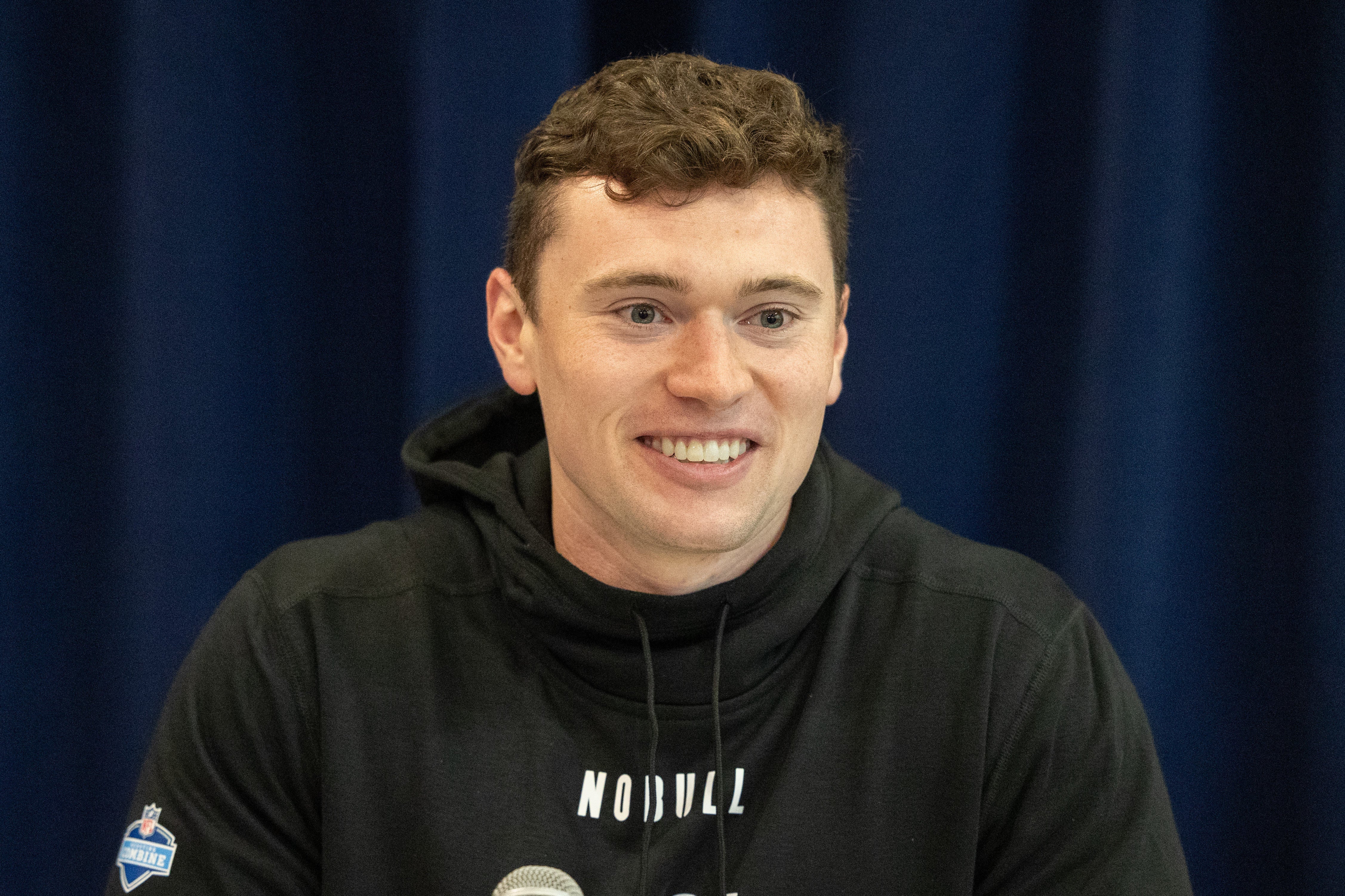 Mar 2, 2024; Indianapolis, IN, USA; Brigham Young place kicker Ryan Rehkow (PK04) talks to the media during the 2024 NFL Combine at Lucas Oil Stadium.