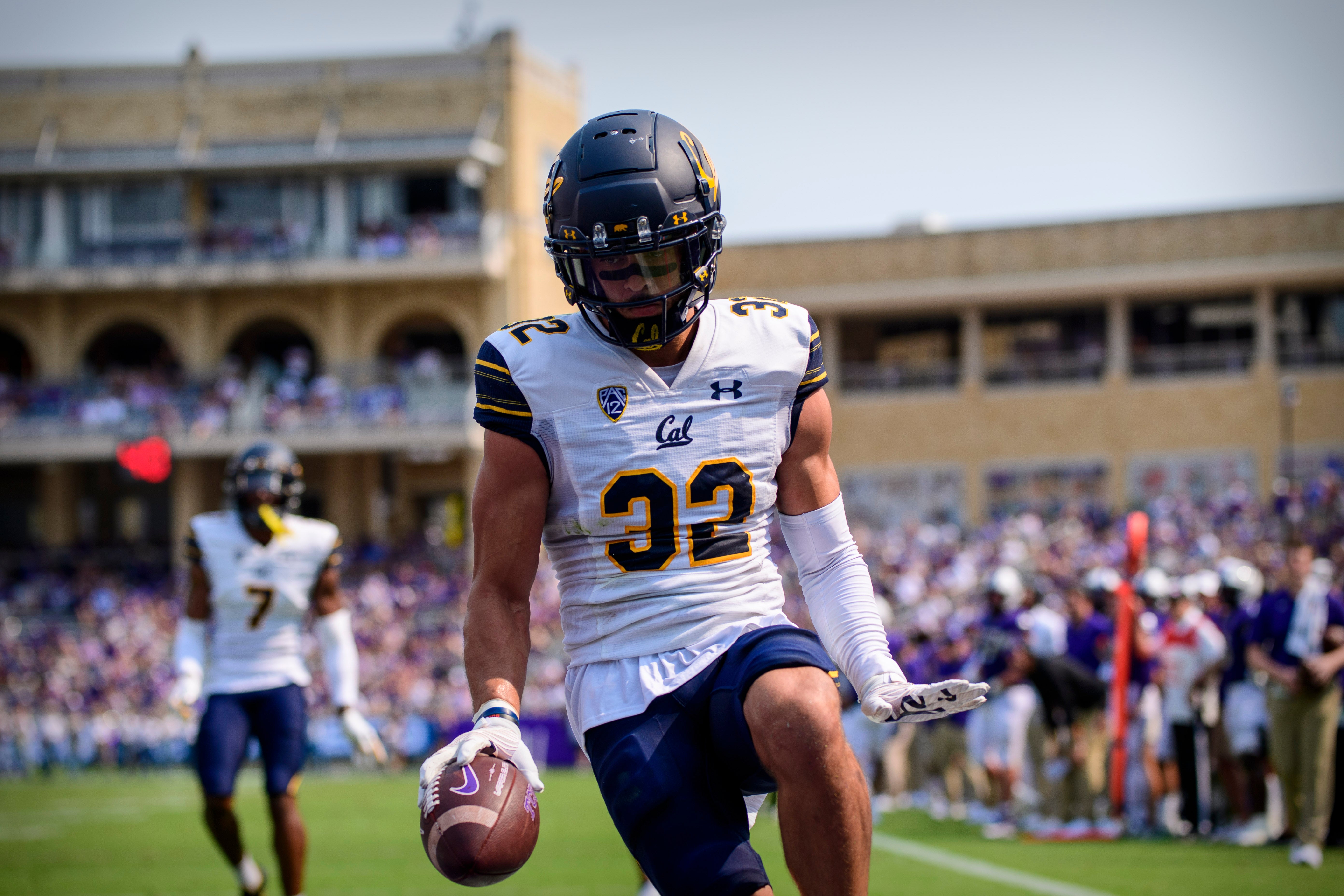 Sep 11, 2021; Fort Worth, Texas, USA; California Golden Bears safety Daniel Scott (32) intercepts a pass by TCU Horned Frogs quarterback Max Duggan (not pictured) and returns it for a touchdown during the first half of the game at Amon G. Carter Stadium.
