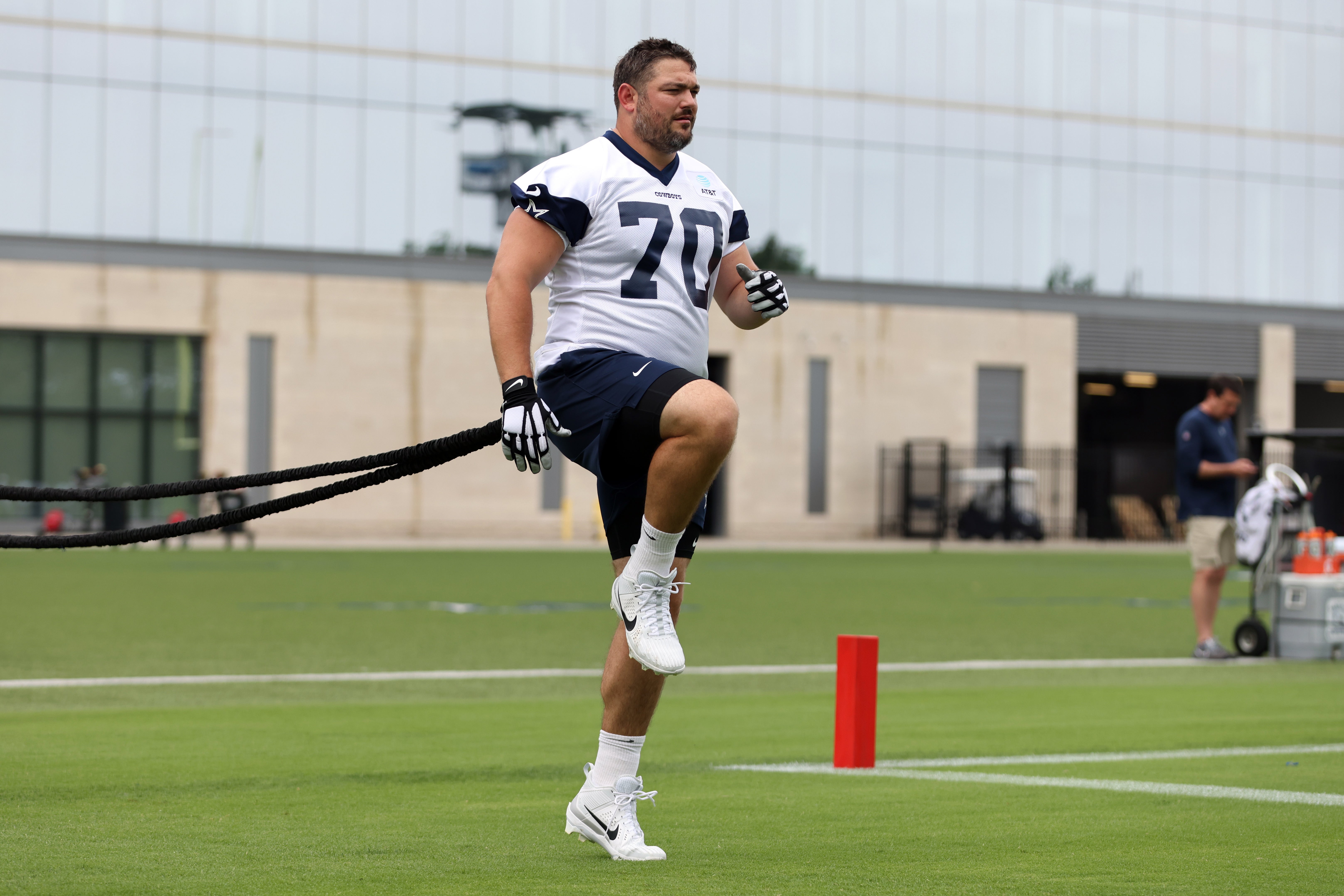 Dallas Cowboys guard Zack Martin (70) runs through a drill during practice at the Ford Center at the Star Training Facility in Frisco, Texas.