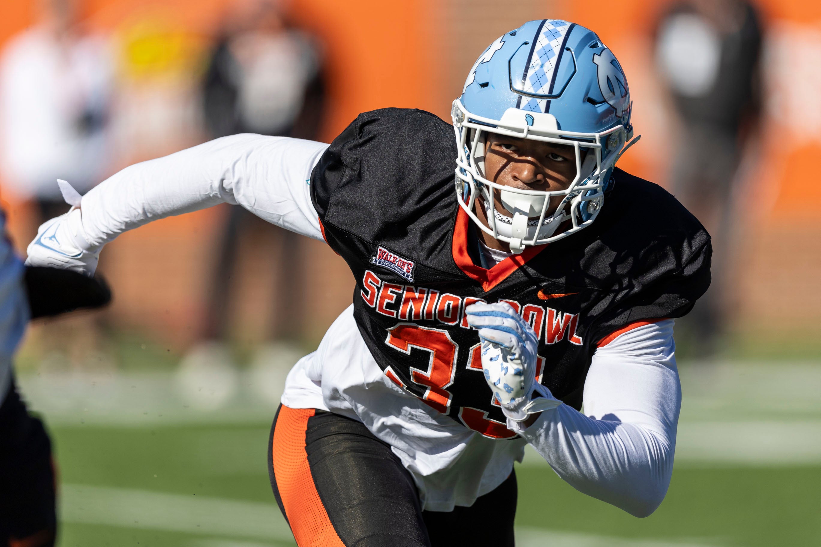 Jan 31, 2024; Mobile, AL, USA; National linebacker Cedric Gray of North Carolina (33) works in coverage during practice for the National team at Hancock Whitney Stadium.
