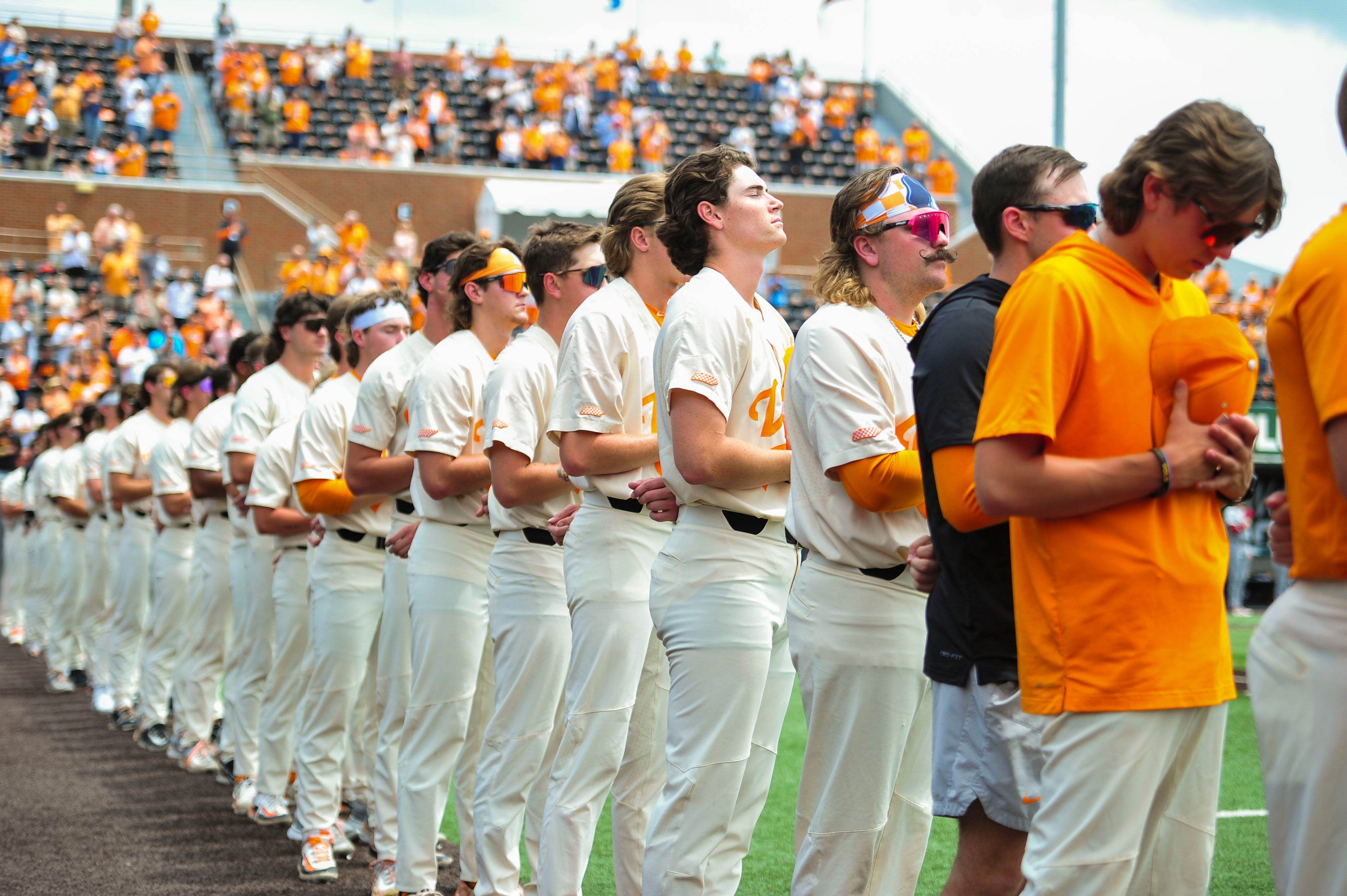 The Tennessee baseball team stands for the national anthem before a NCAA baseball game at Lindsey Nelson Stadium on Saturday, May 18, 2024. Tennessee won 4-1 against South Carolina.