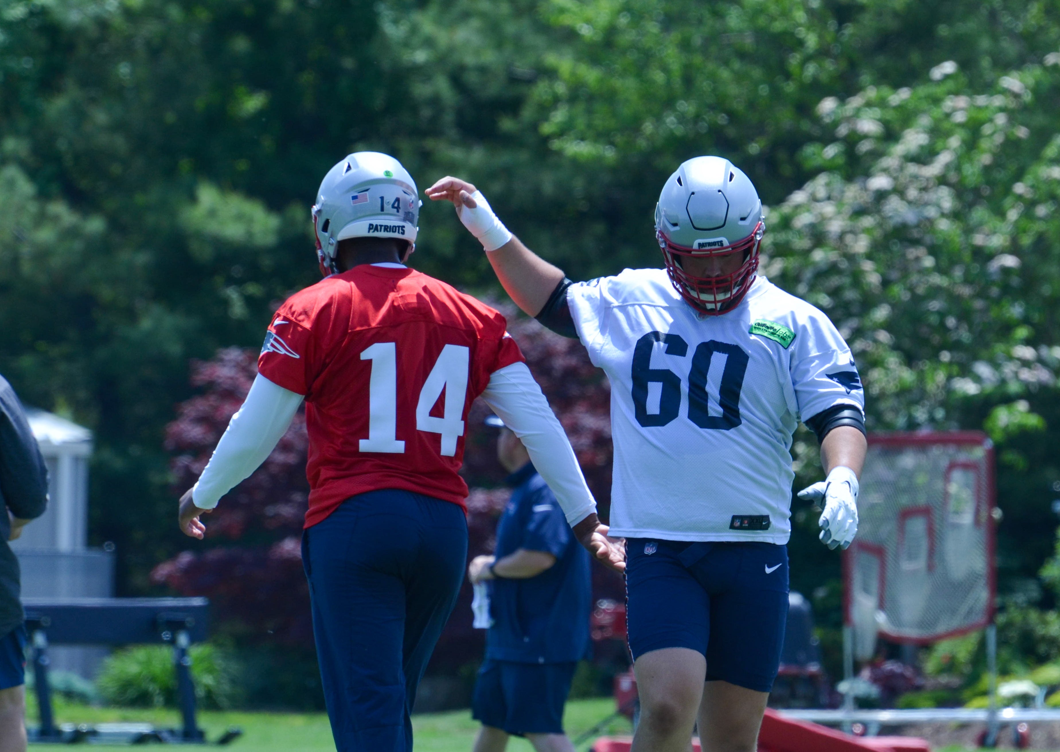 Patriots C David Andrews and QB Jacoby Brissett at Tuesday's OTAs - June 4, 2024