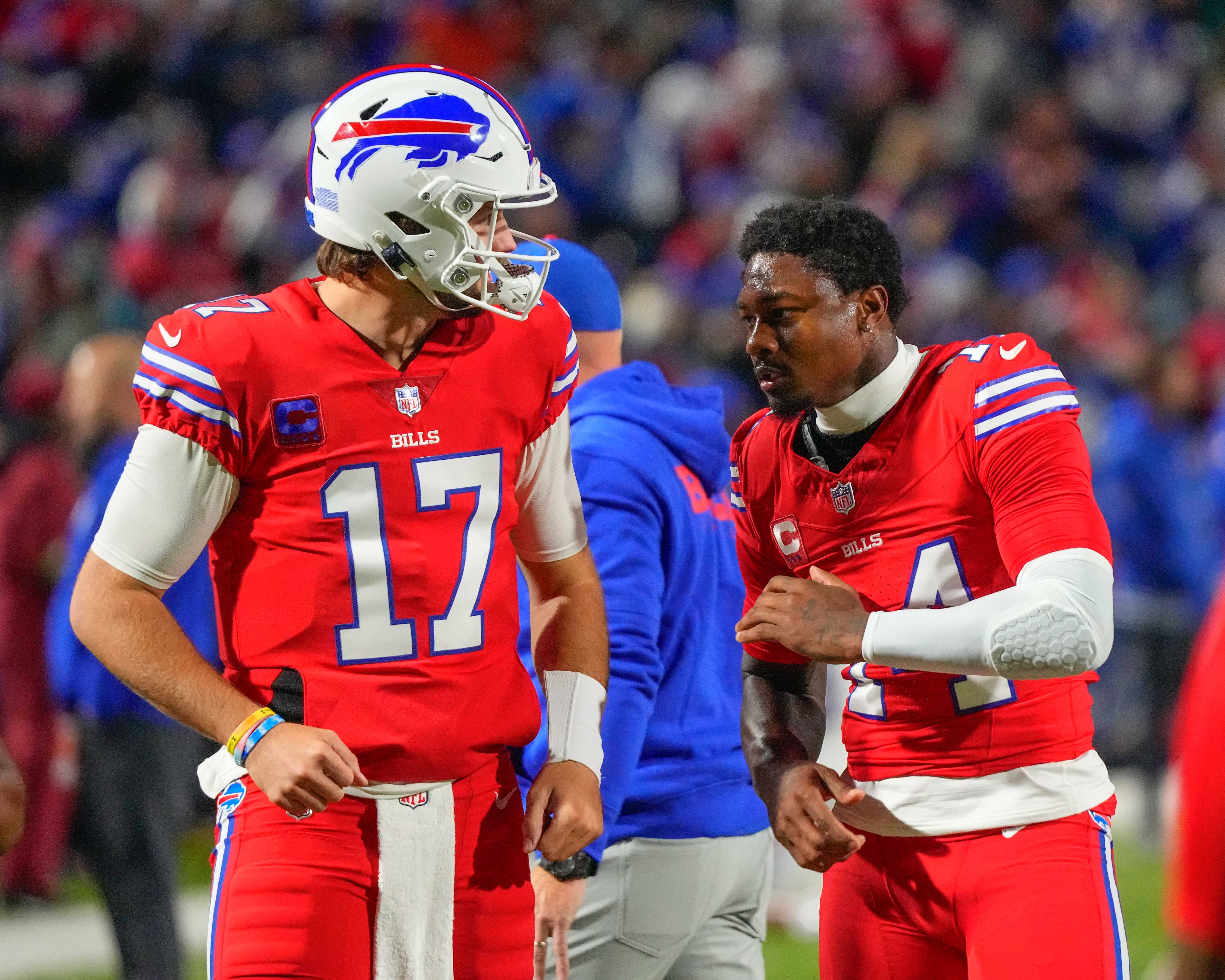 Oct 15, 2023; Orchard Park, New York, USA; Buffalo Bills quarterback Josh Allen (17) and Buffalo Bills wide receiver Stefon Diggs (14) speak prior to the game against the New York Giants at Highmark Stadium.