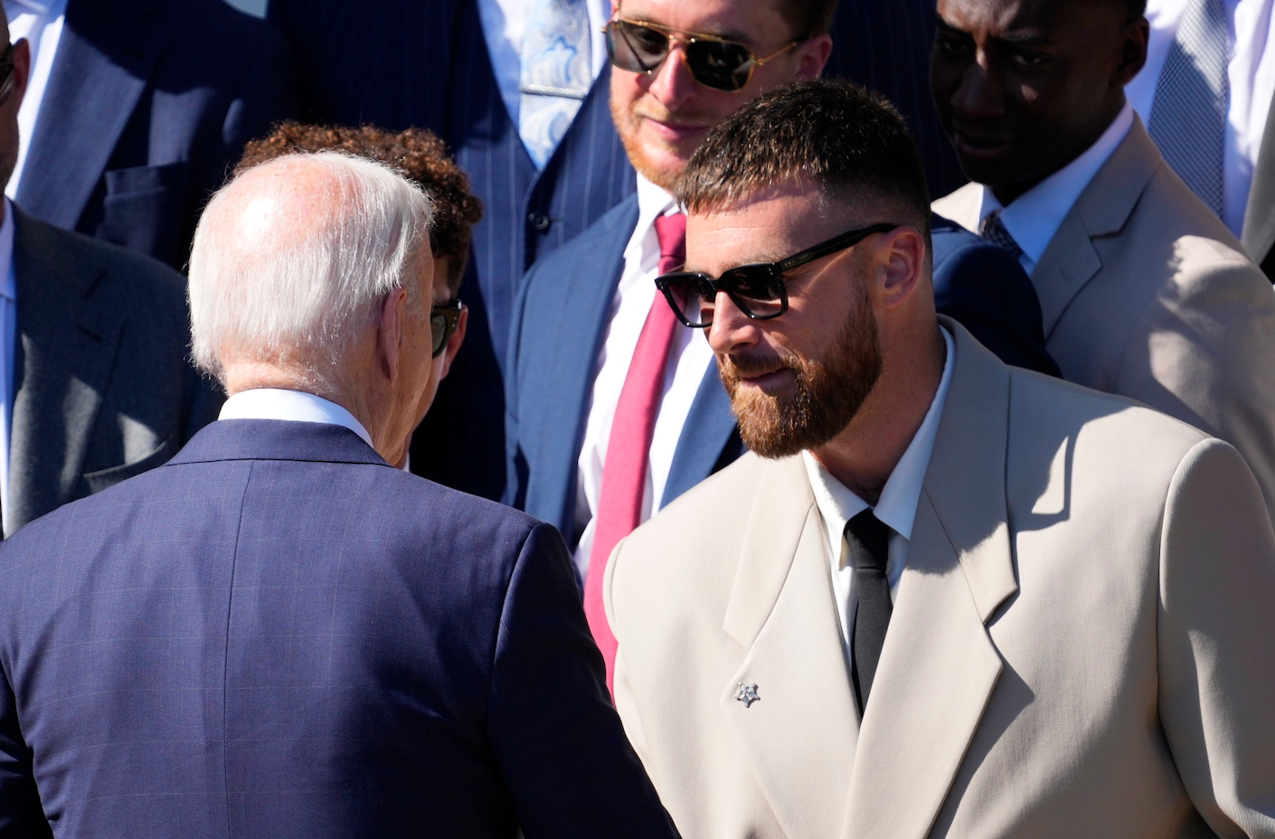 President Joe Biden shakes hands with Kansas City Chiefs tight end Travis Kelce as he welcomes the team to the White House to celebrate their championship season and victory in Super Bowl LVIII on Friday, May 31, 2024.