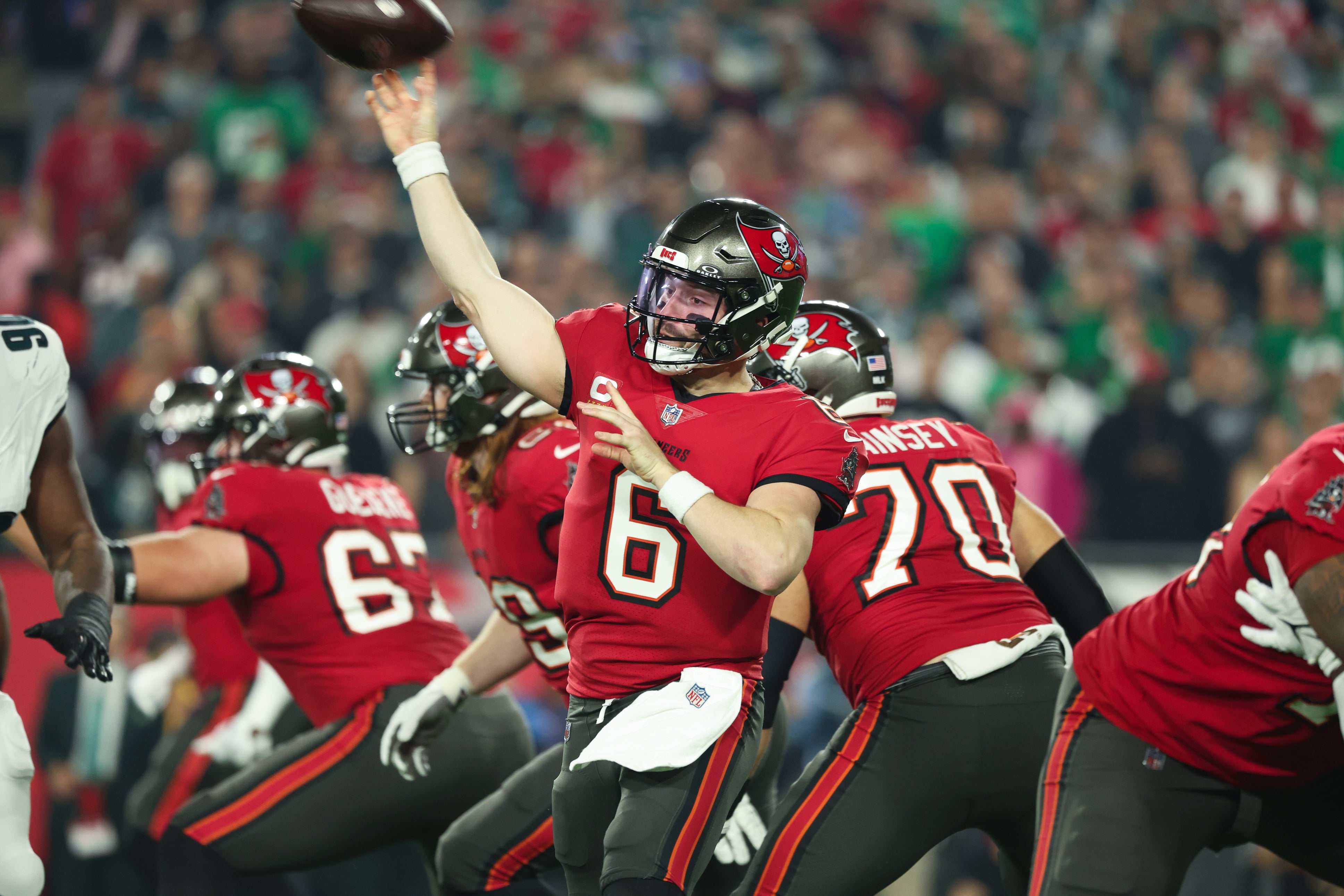 Jan 15, 2024; Tampa, Florida, USA; Tampa Bay Buccaneers quarterback Baker Mayfield (6) throws against the Philadelphia Eagles during the first half of a 2024 NFC wild card game at Raymond James Stadium.