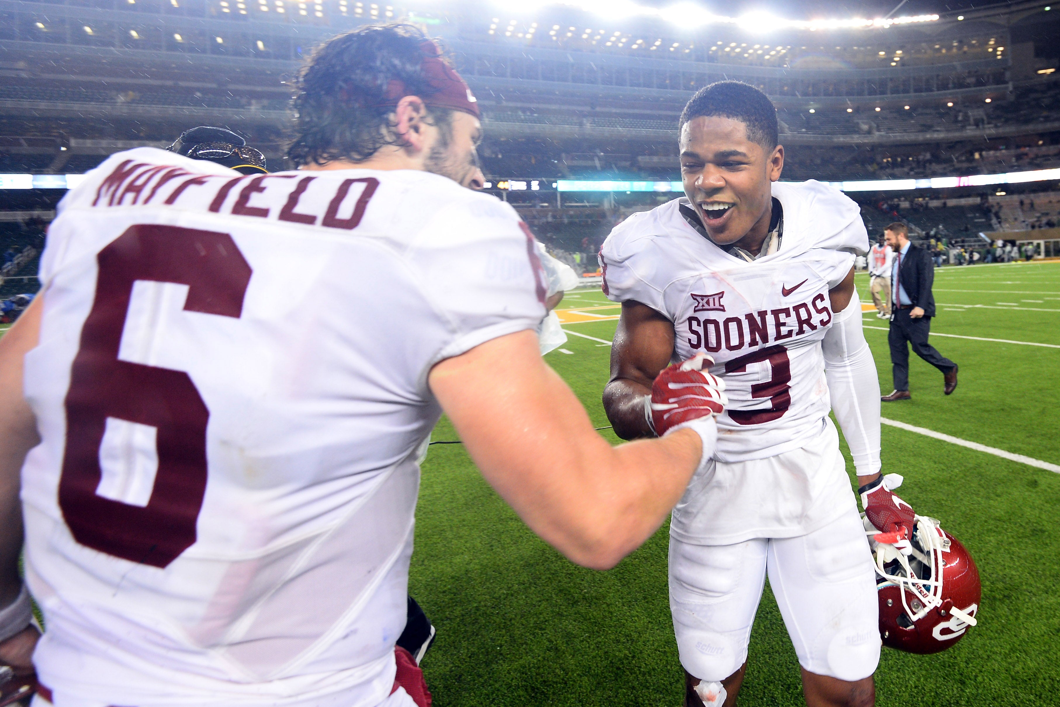 Nov 14, 2015; Waco, TX, USA; Oklahoma Sooners quarterback Baker Mayfield (6) and wide receiver Sterling Shepard (3) celebrate after the game against the Baylor Bears at McLane Stadium. Oklahoma won 44-34.