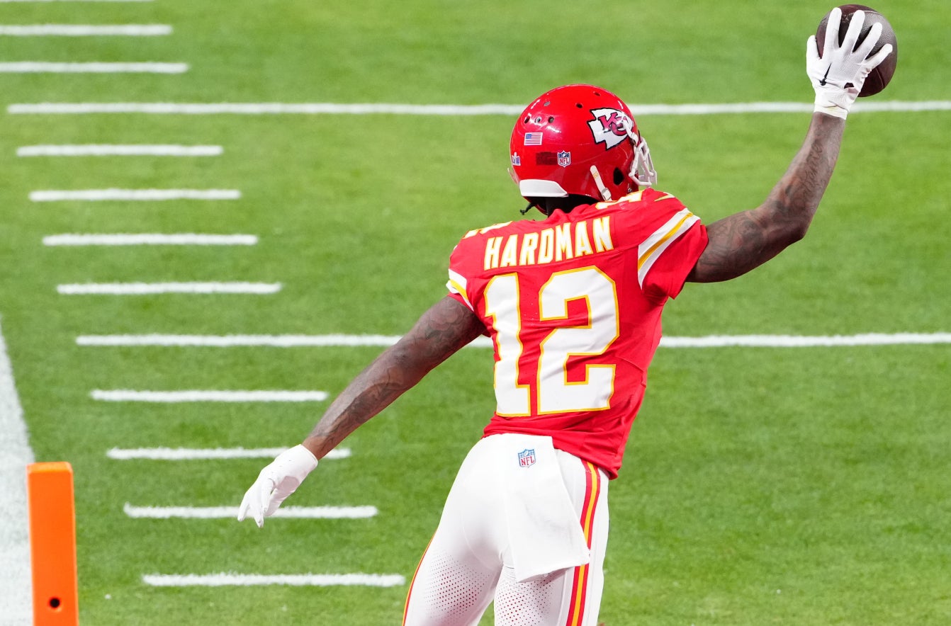 Feb 11, 2024; Paradise, Nevada, USA; Kansas City Chiefs wide receiver Mecole Hardman Jr. (12) scores the winning touchdown against the San Francisco 49ers during overtime in Super Bowl LVIII at Allegiant Stadium.