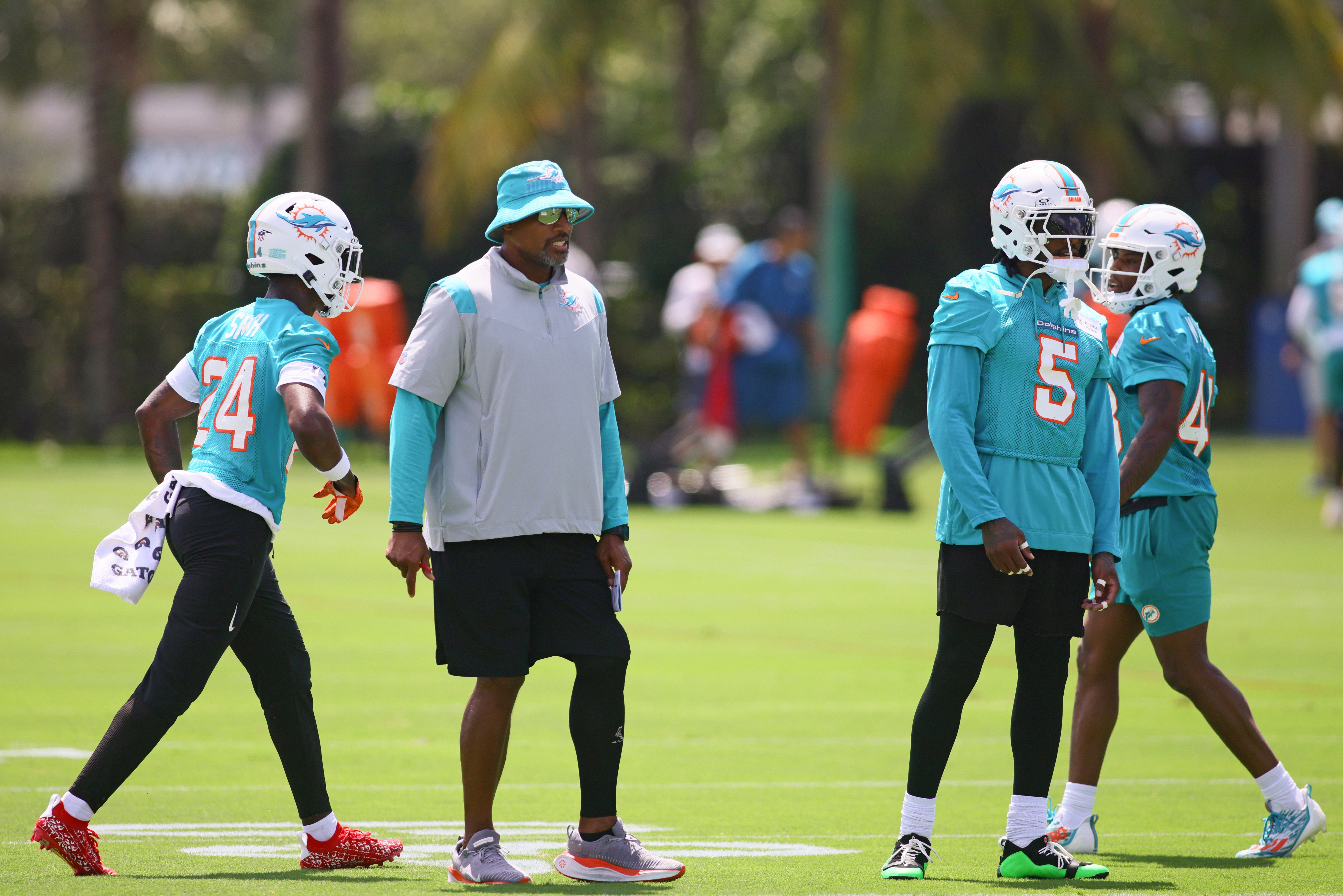 Jun 4, 2024; Miami Gardens, FL, USA; Miami Dolphins defensive coordinator Anthony Weaver works with his players during mandatory minicamp at Baptist Health Training Complex.