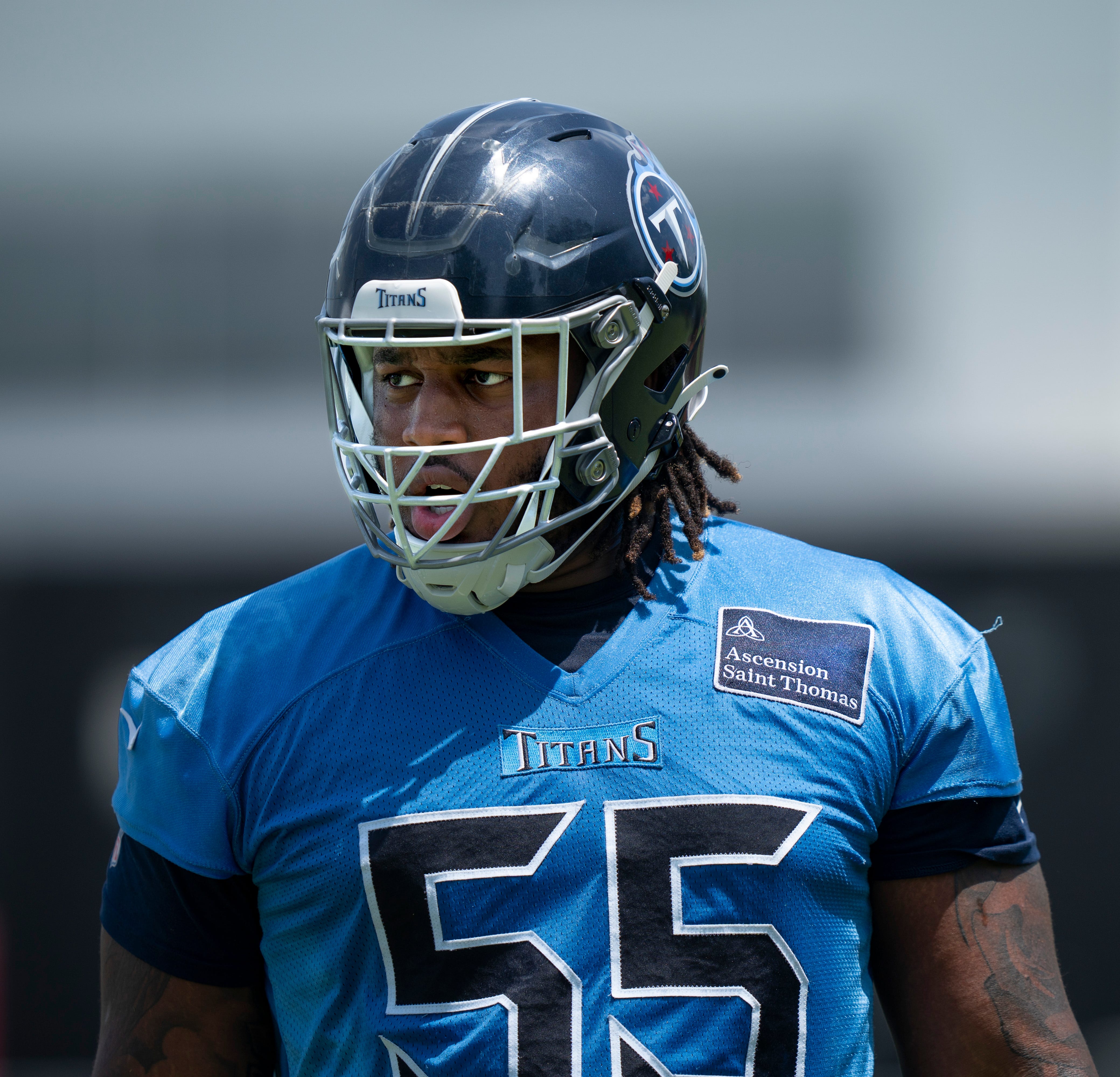Tackle JC Latham (55) runs through drills during Tennessee Titans practice at Ascension Saint Thomas Sports Park in Nashville, Tenn., Wednesday, May 29, 2024.