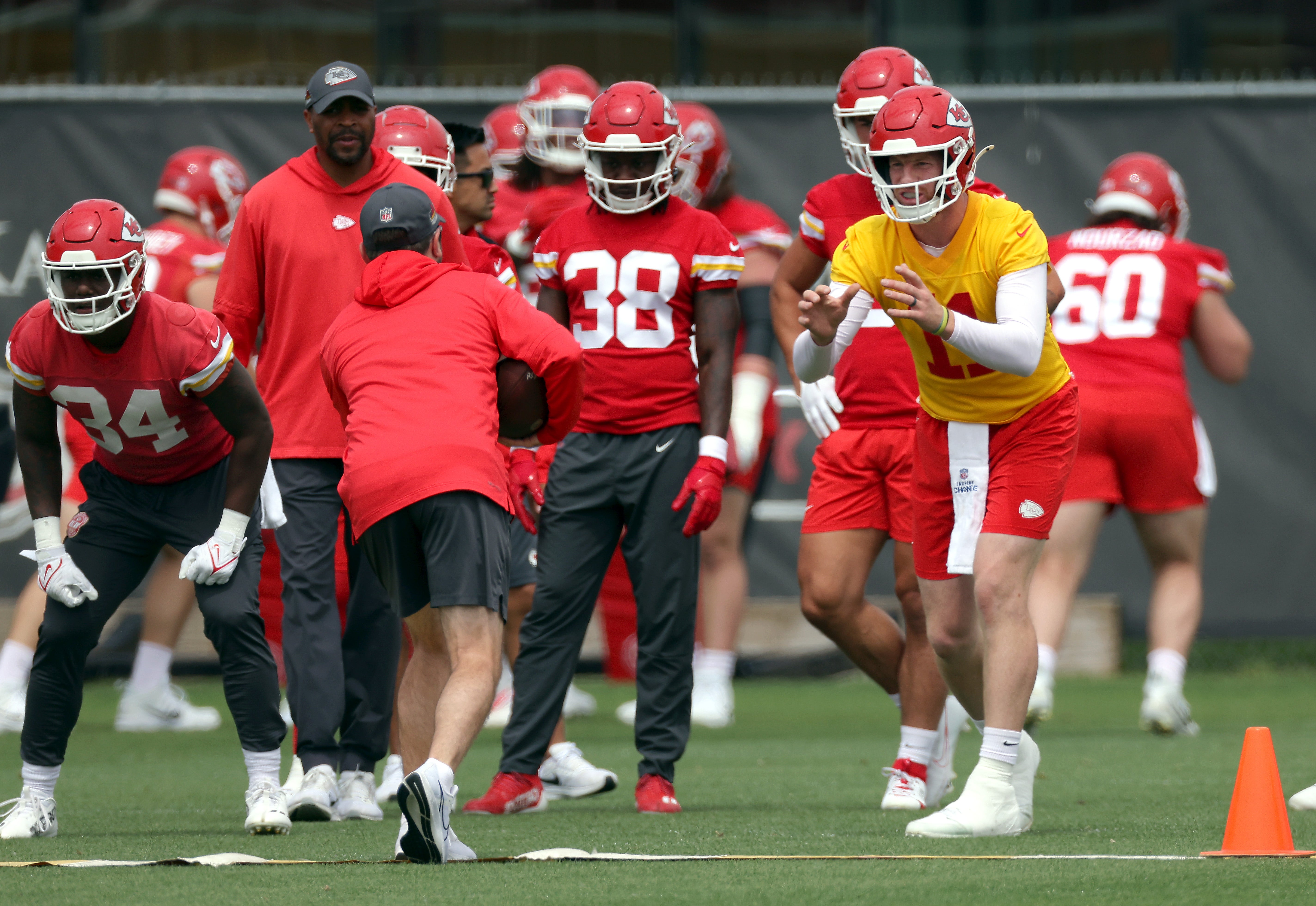 KANSAS CITY, MISSOURI - MAY 22: Quarterback Carson Wentz #11 of the Kansas City Chiefs participates in OTA Offseason workouts at The University of Kansas Health System Training Complex on May 22, 2024 in Kansas City, Missouri.