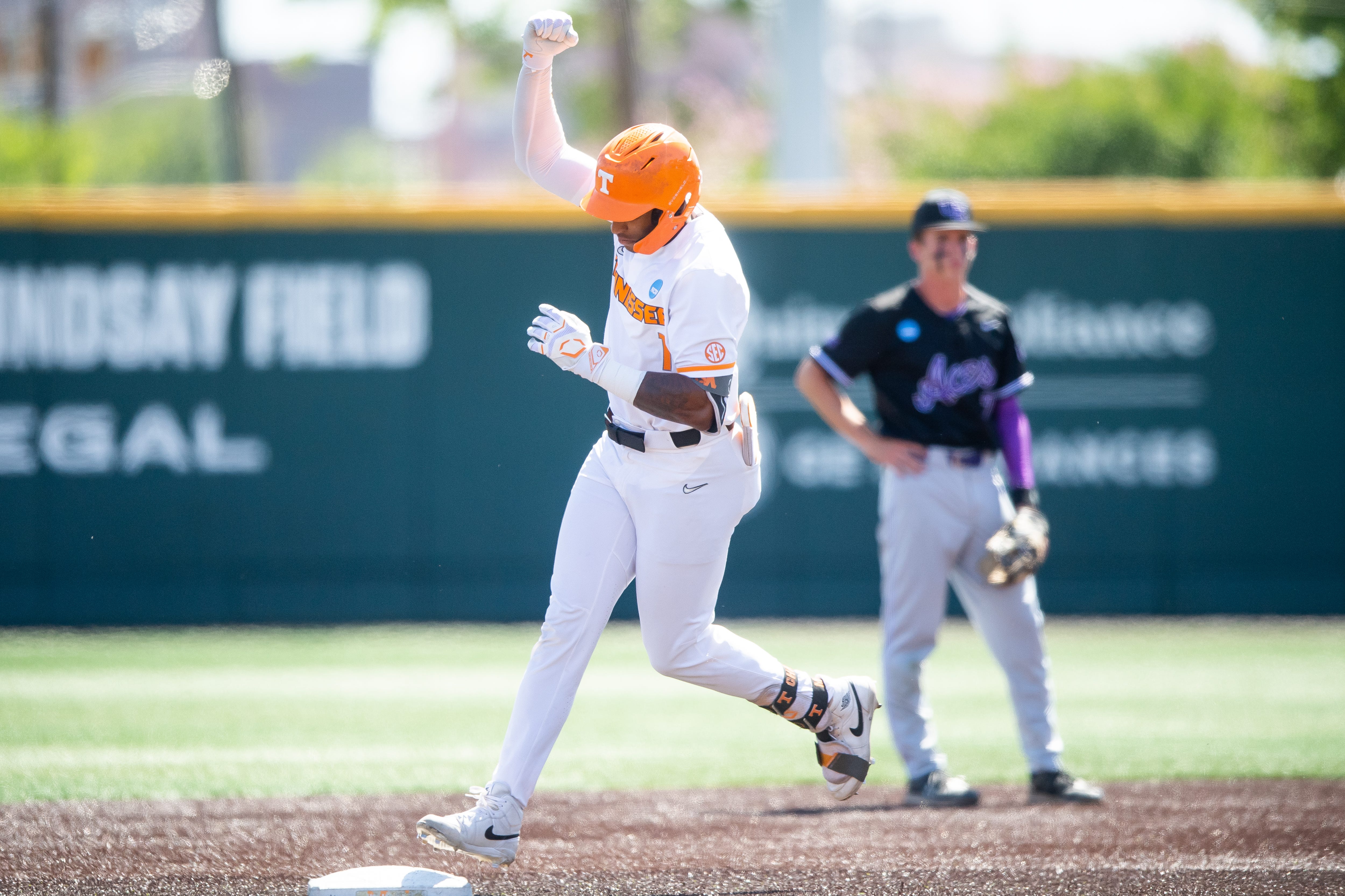 Tennessee's Christian Moore (1) pumps his fist as he rounds the bases after hitting a home run during a NCAA baseball tournament Knoxville Super Regional game between Tennessee and Evansville held at Lindsey Nelson Stadium on Friday, June 7, 2024.