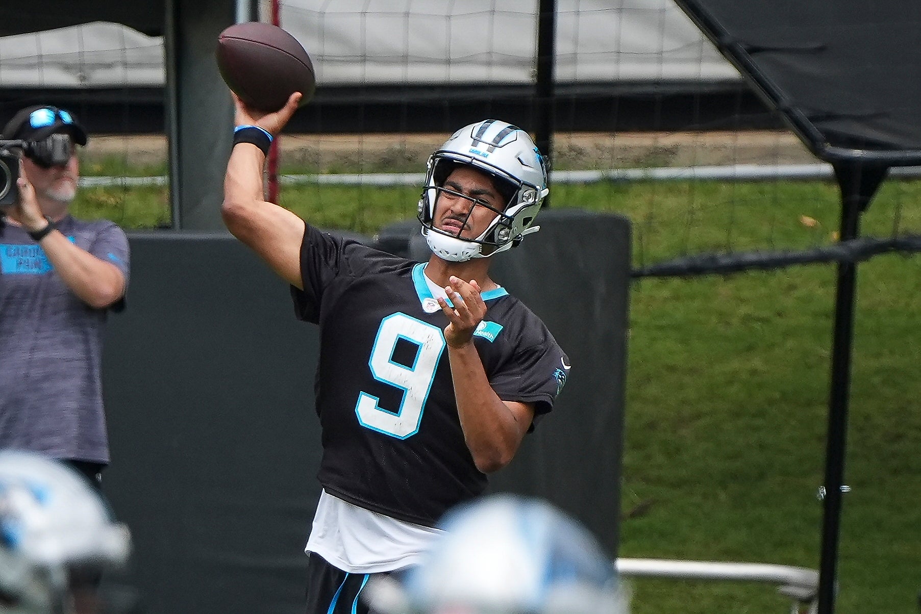Jun 4, 2024; Charlotte, NC, USA; Carolina Panthers quarterback Bryce Young (9) throws during OTAs. Mandatory Credit: Jim Dedmon-USA TODAY Sports