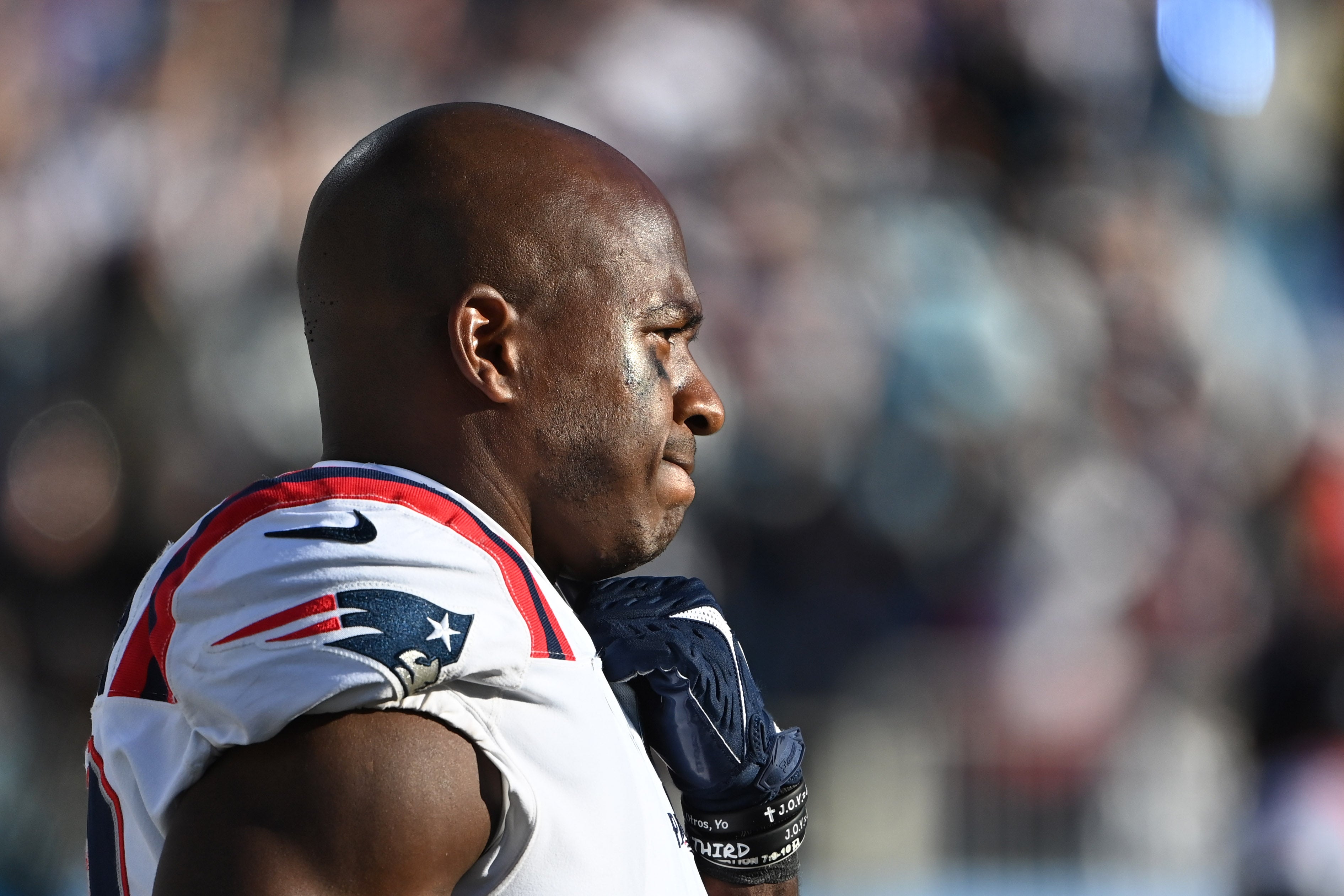 Nov 7, 2021; Charlotte, North Carolina, USA; New England Patriots wide receiver Matthew Slater (18) on the sidelines in the fourth quarter at Bank of America Stadium.
