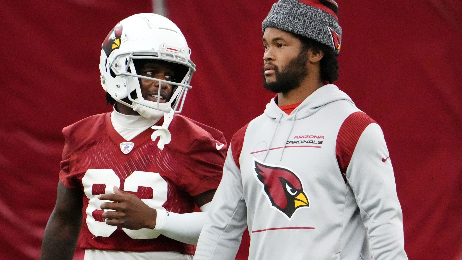 Arizona Cardinals wide receiver Greg Dortch (83) talks to quarterback Kyler Murray during practice at Cardinals Dignity Health training facility in Tempe on Aug. 30, 2023.