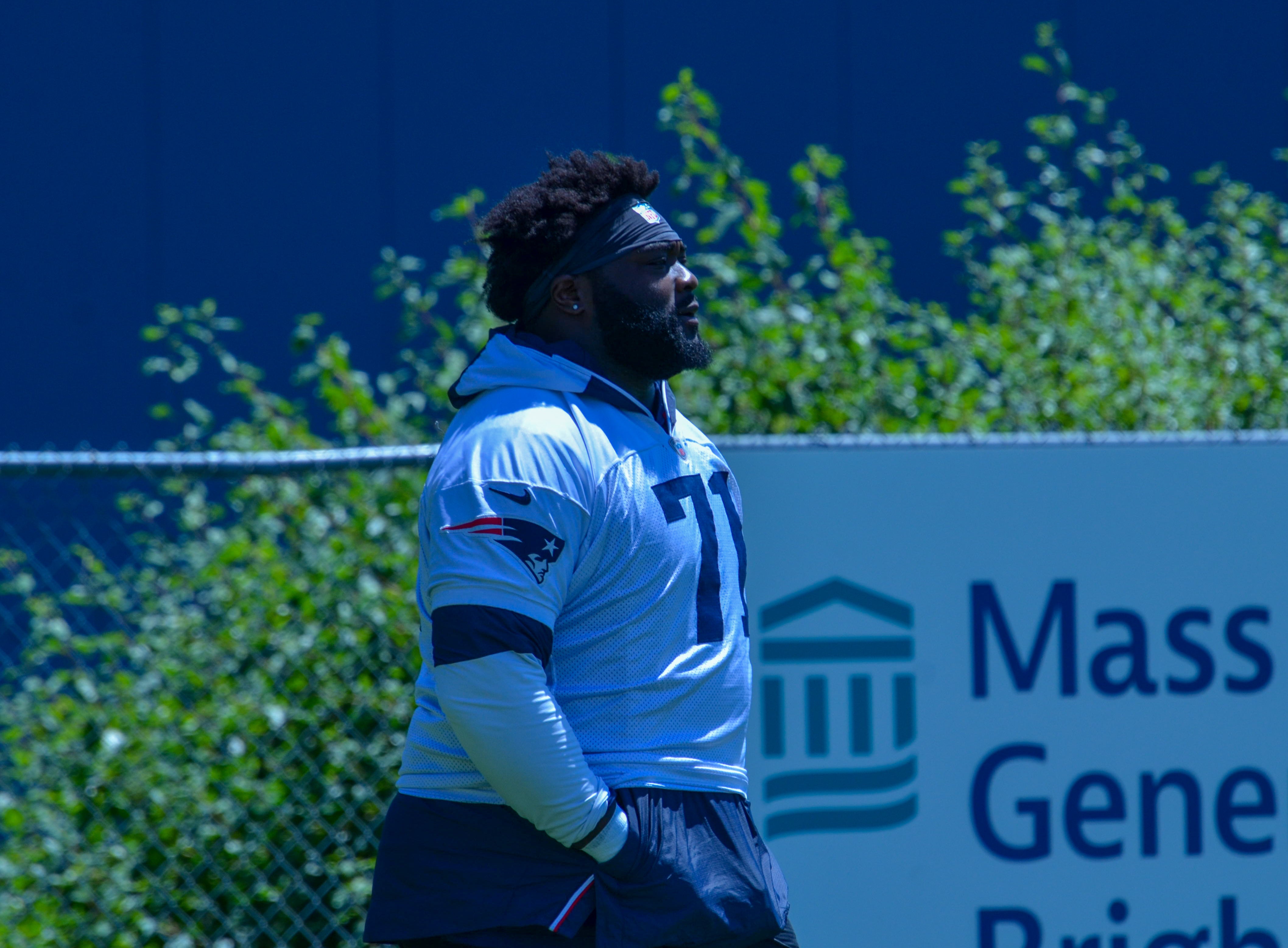 Patriots OL Mike Onwenu arrives at the first day of Mandatory Minicamp at Gillette Stadium - June 10, 2024