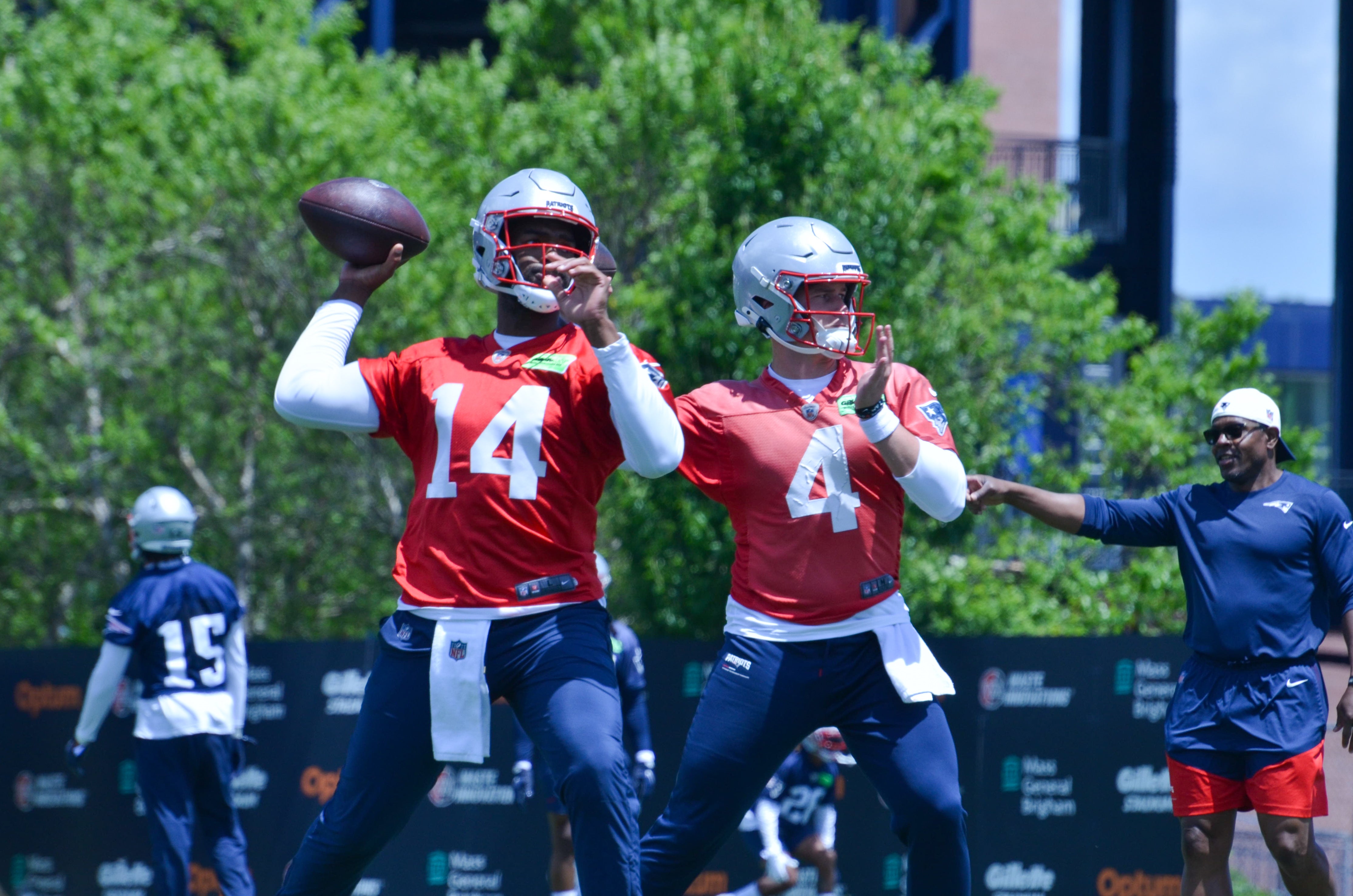 Patriots QBs Jacoby Brissett and Bailey Zappe throw the ball during the first day of Mandatory Minicamp at Gillette Stadium - June 10, 2024