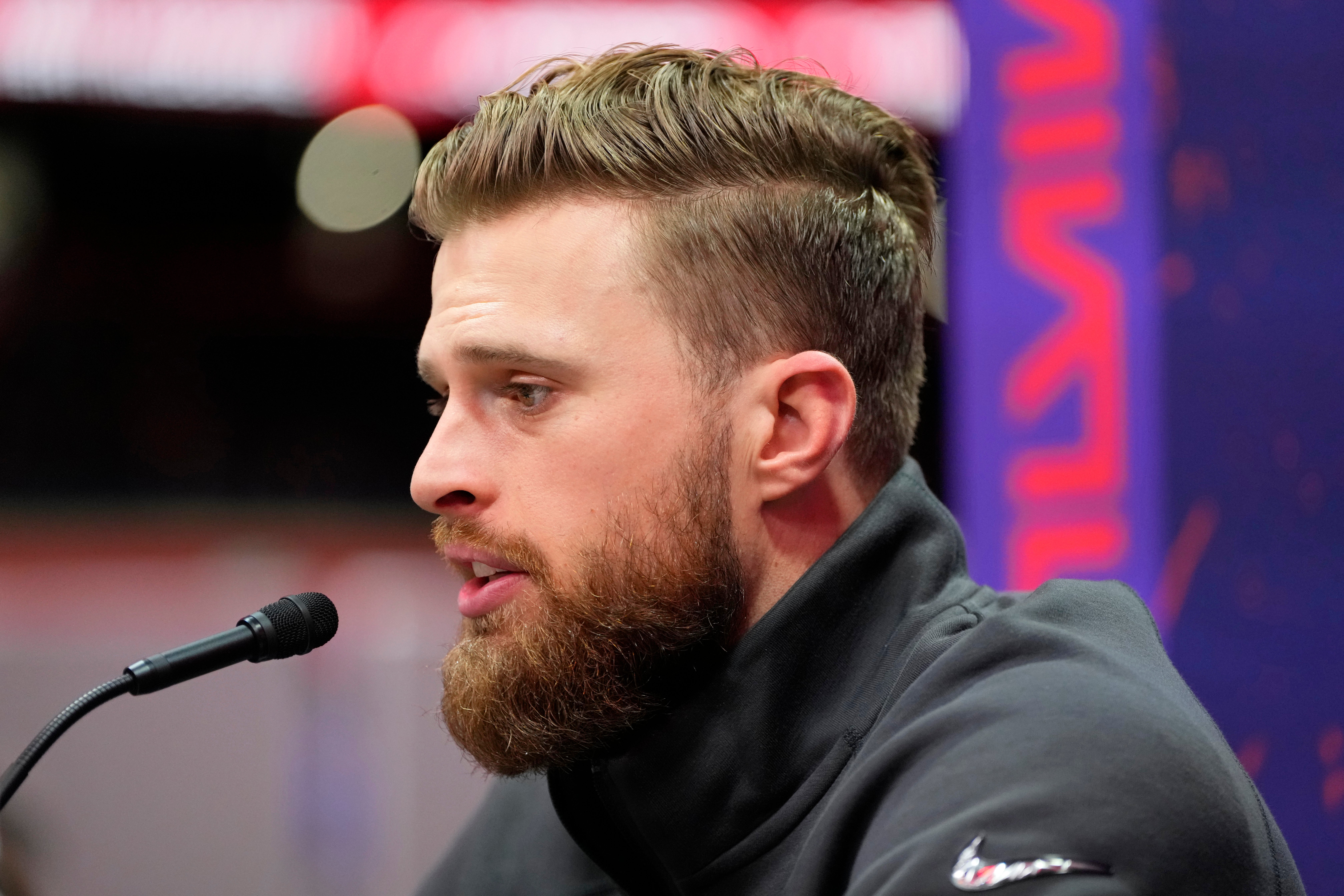 Feb 5, 2024; Las Vegas, NV, USA; Kansas City Chiefs place kicker Harrison Butker (7) talks to the media during Super Bowl LVIII Opening Night at Allegiant Stadium.