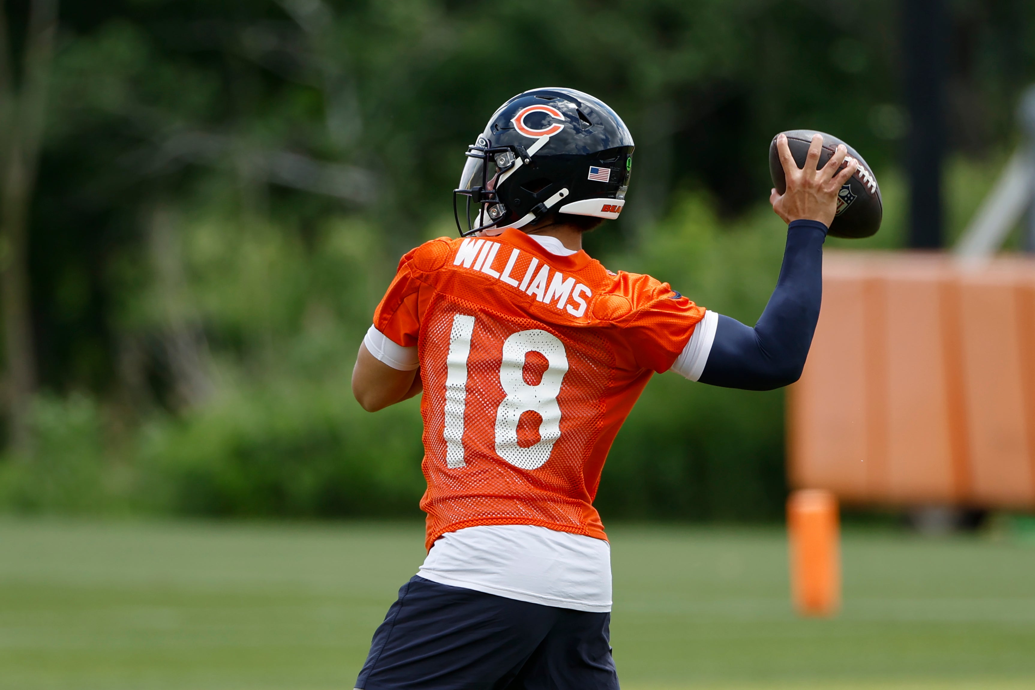 Jun 5, 2024; Lake Forest, IL, USA; Chicago Bears quarterback Caleb Williams (18) looks to pass the ball during the team's minicamp at Halas Hall.