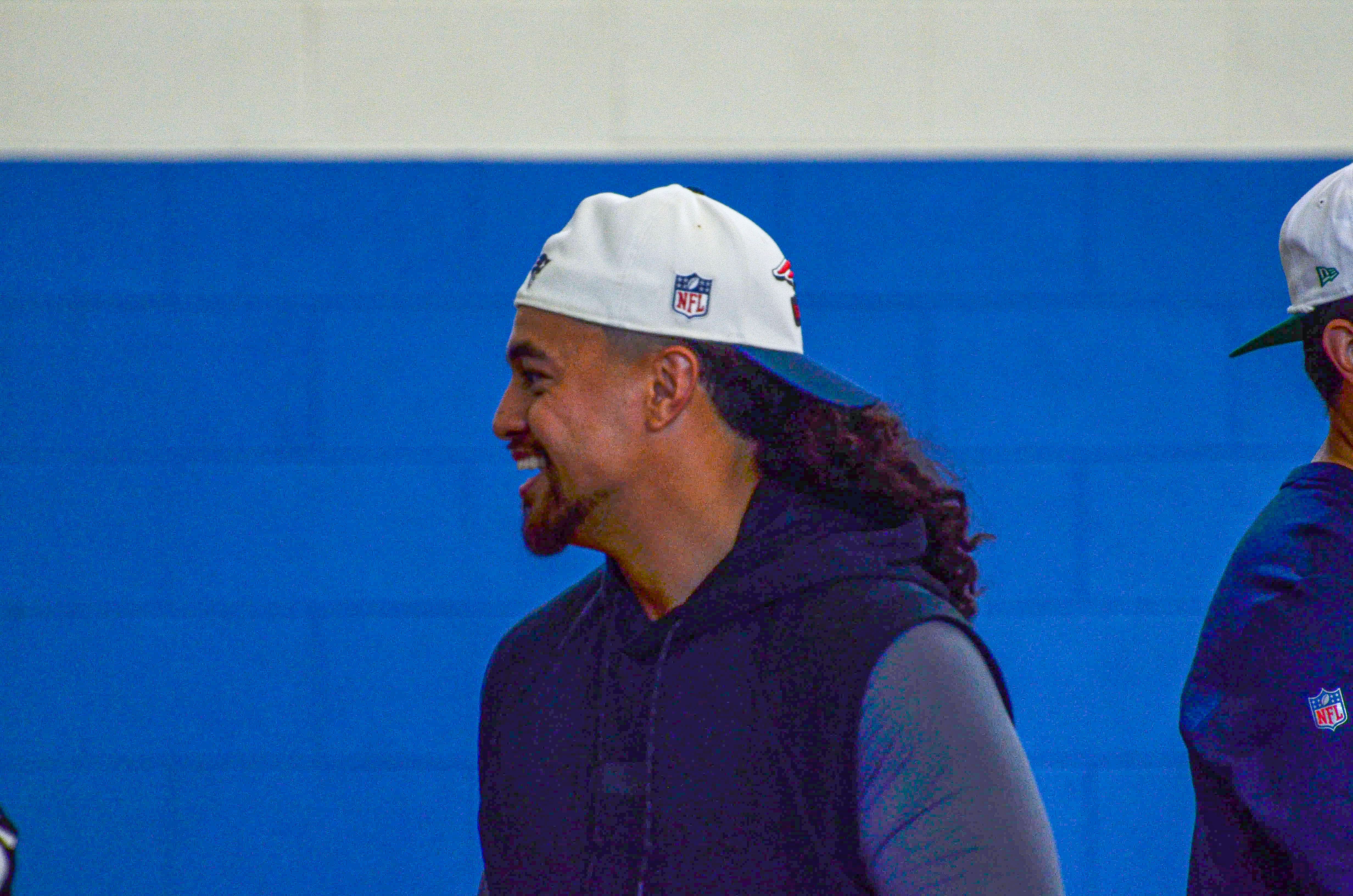 Linebacker Sione Takitaki laughs at the New England Patriots community event at the Perkins Community Center/Lee School - June 11, 2024