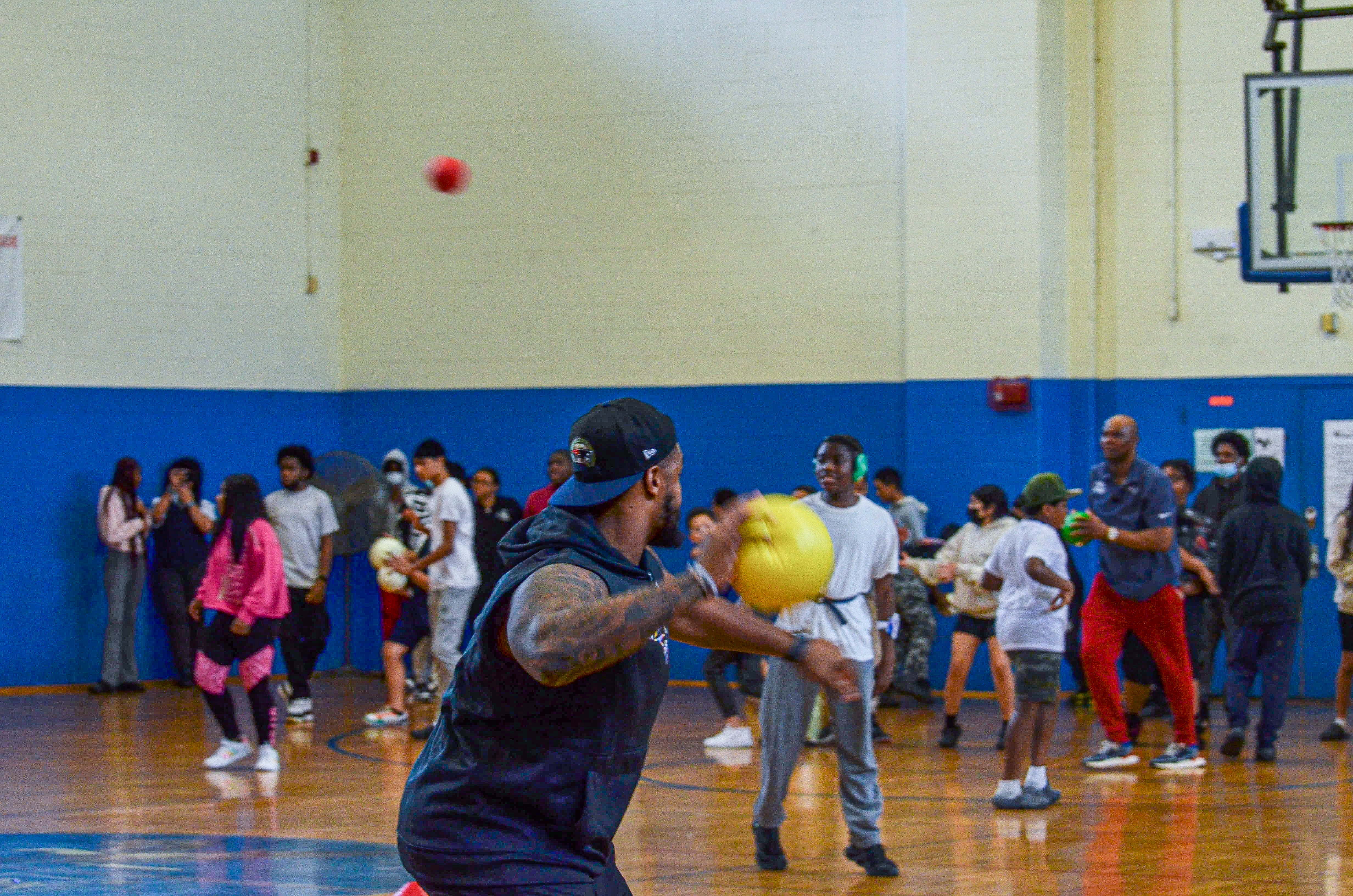 Guard Nick Leverett plays dodgeball against students at the New England Patriots community event at the Perkins Community Center/Lee School - June 11, 2024
