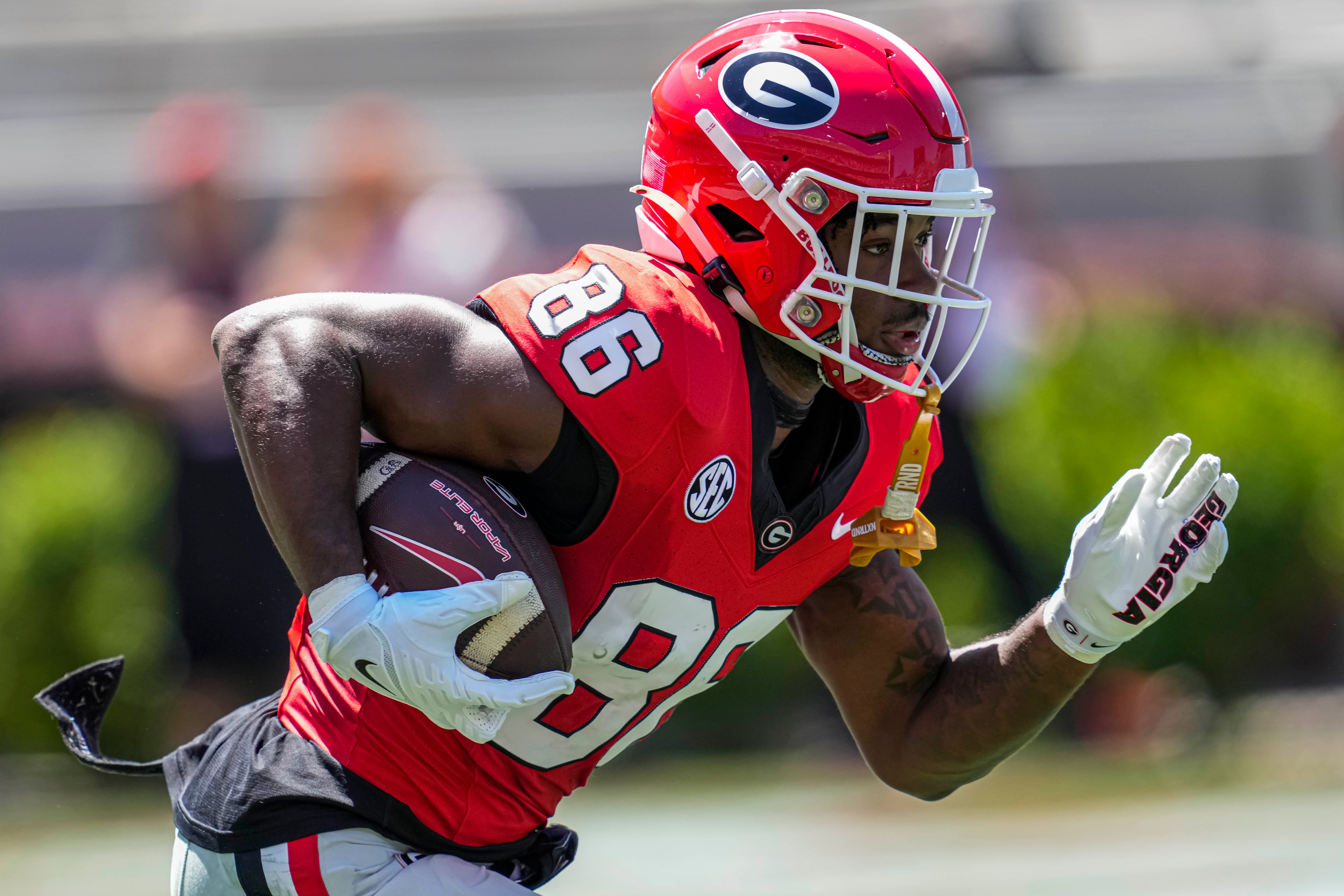 Apr 13, 2024; Athens, GA, USA; Georgia Bulldogs wide receiver Dillon Bell (86) runs with the ball during the G-Day Game at Sanford Stadium.