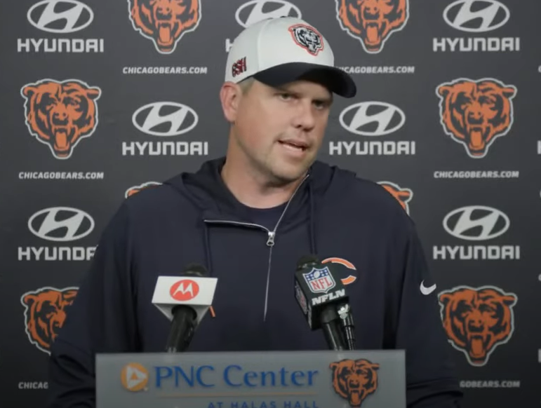 Shane Waldron addresses the media following practice at Halas Hall.