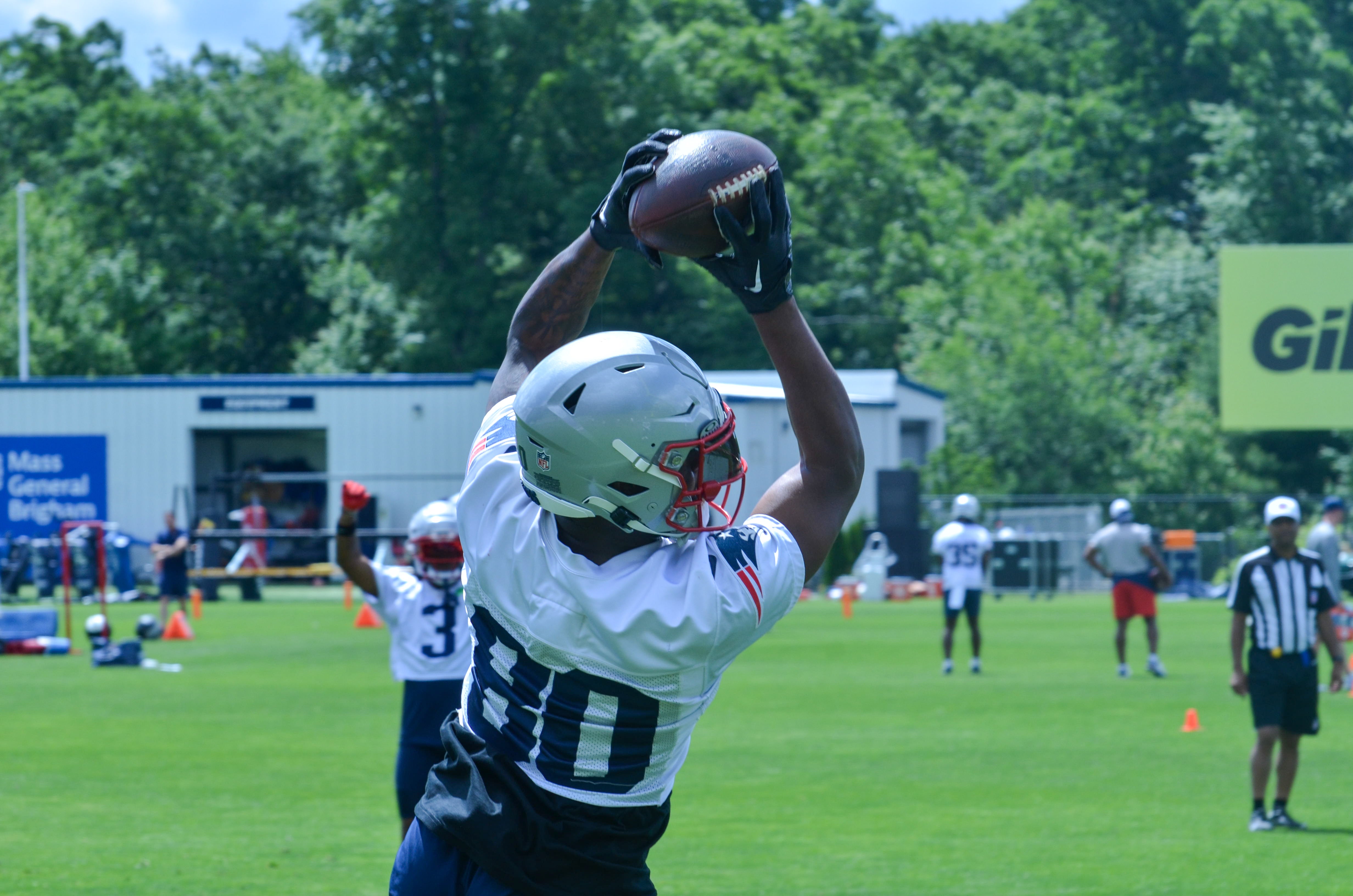 Patriots WR Kayshon Boutte makes a leaping catch during the team's final day of mandatory minicamp - June 12, 2024