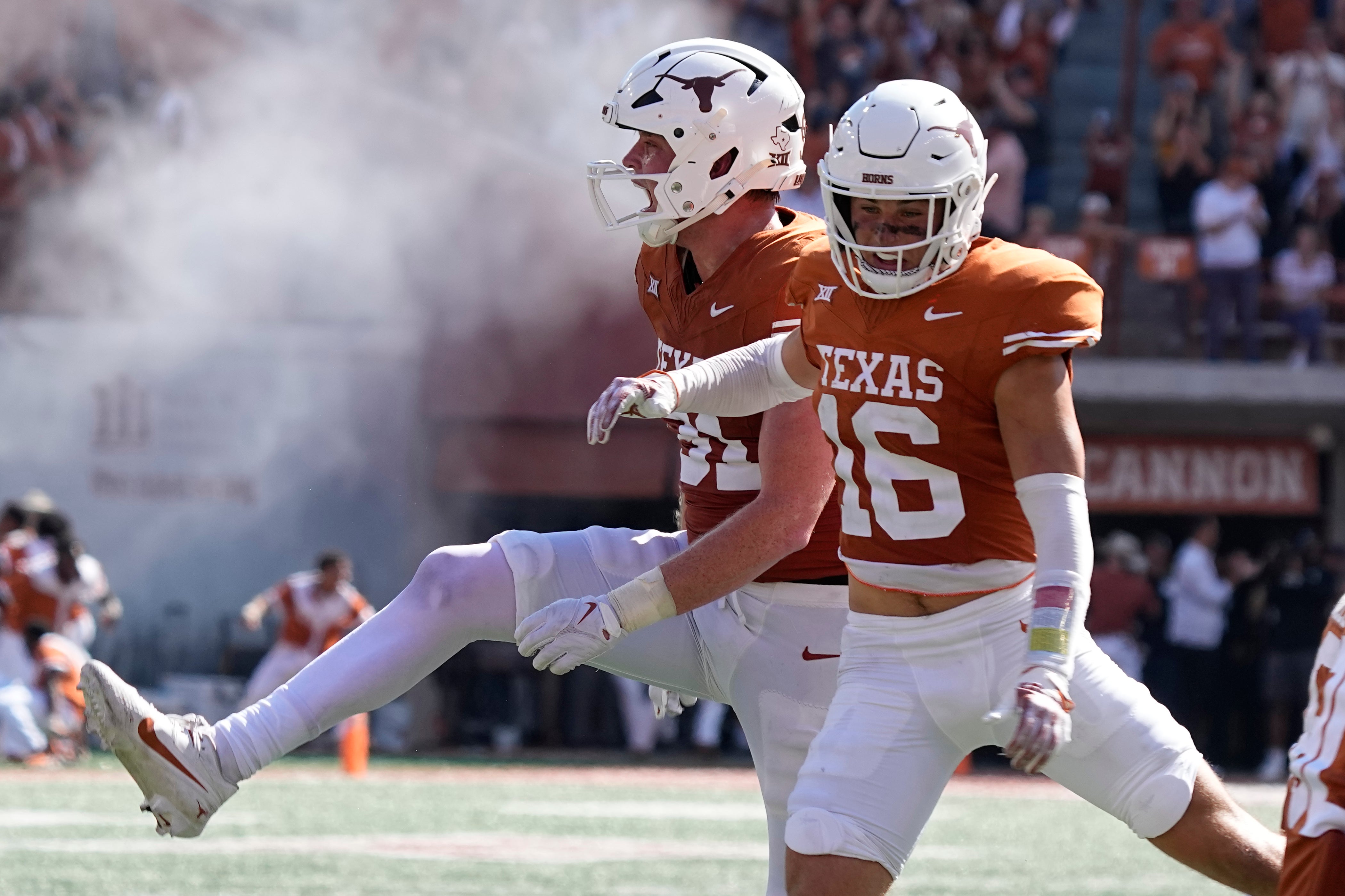 Nov 4, 2023; Austin, Texas, USA; Texas Longhorns linebacker Ethan Burke (91) and defensive back Michael Taaffe (16) react after Kansas State Wildcats missed a potential game tying field goal late in the second half at Darrell K Royal-Texas Memorial Stadium.